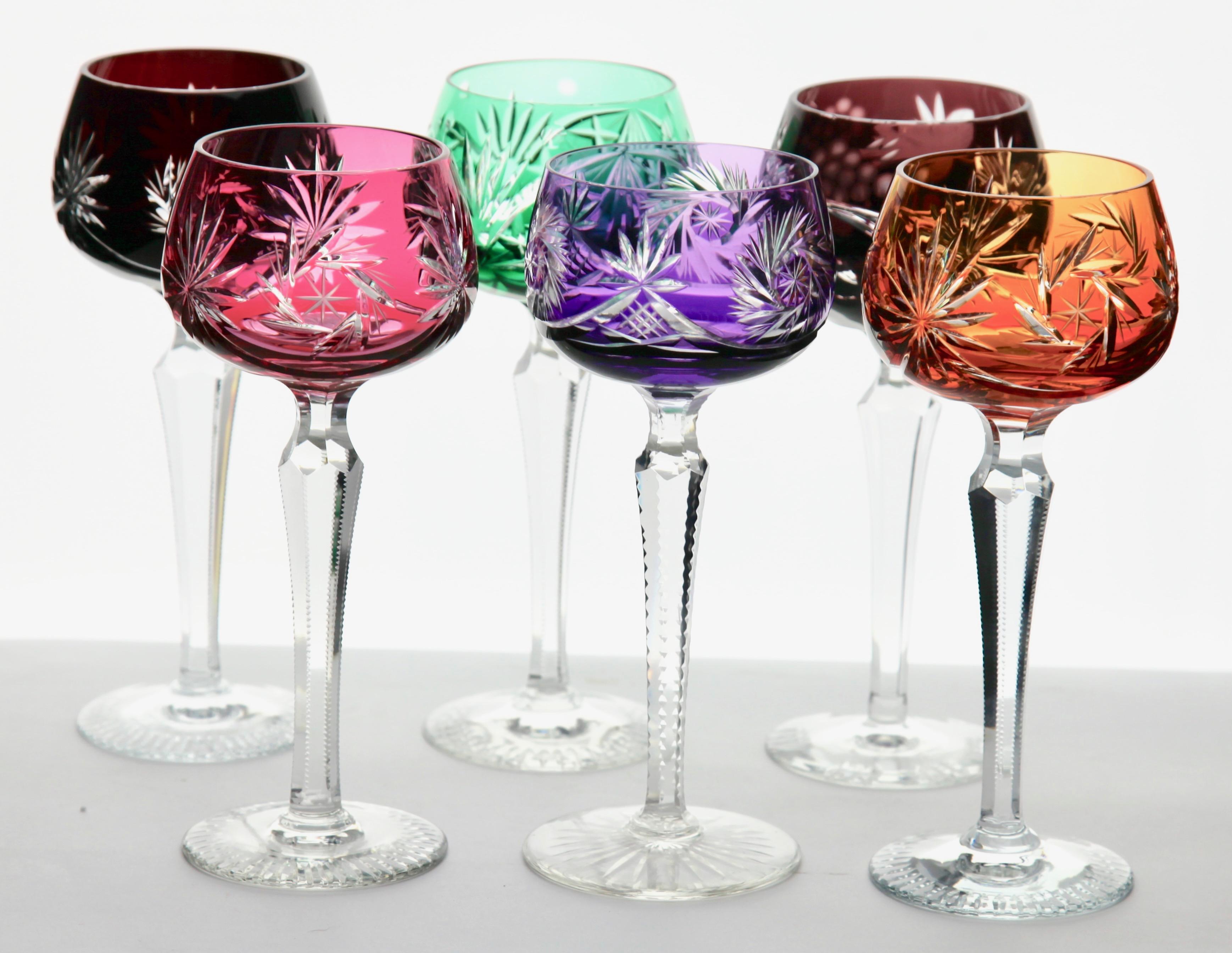 Vintage mix set of 6 cut to clear crystal stem glasses.
Mix crystal (Bleikristall 24% Mundgeblasen Handgeschliffen) glasses

Clear demi crystal glass. Side facetted and toothed stem. The bowl with colored overlay cut to clear. 
In best