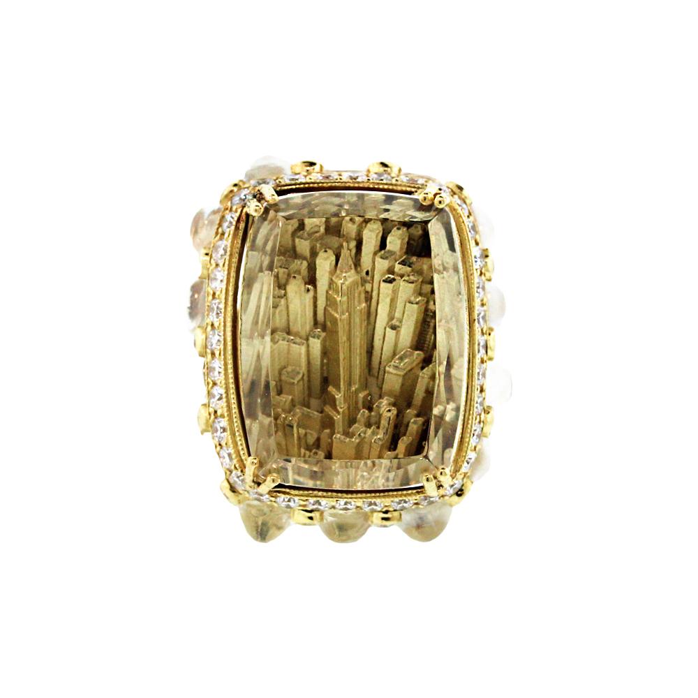 IF YOU ARE REALLY INTERESTED, CONTACT US WITH ANY REASONABLE OFFER. WE WILL TRY OUR BEST TO MAKE YOU HAPPY!

18K Yellow Gold and Diamond Carved New York Skyline Ring with Crystal center and Rainbow Moonstones

Center has a Crystal set with the New