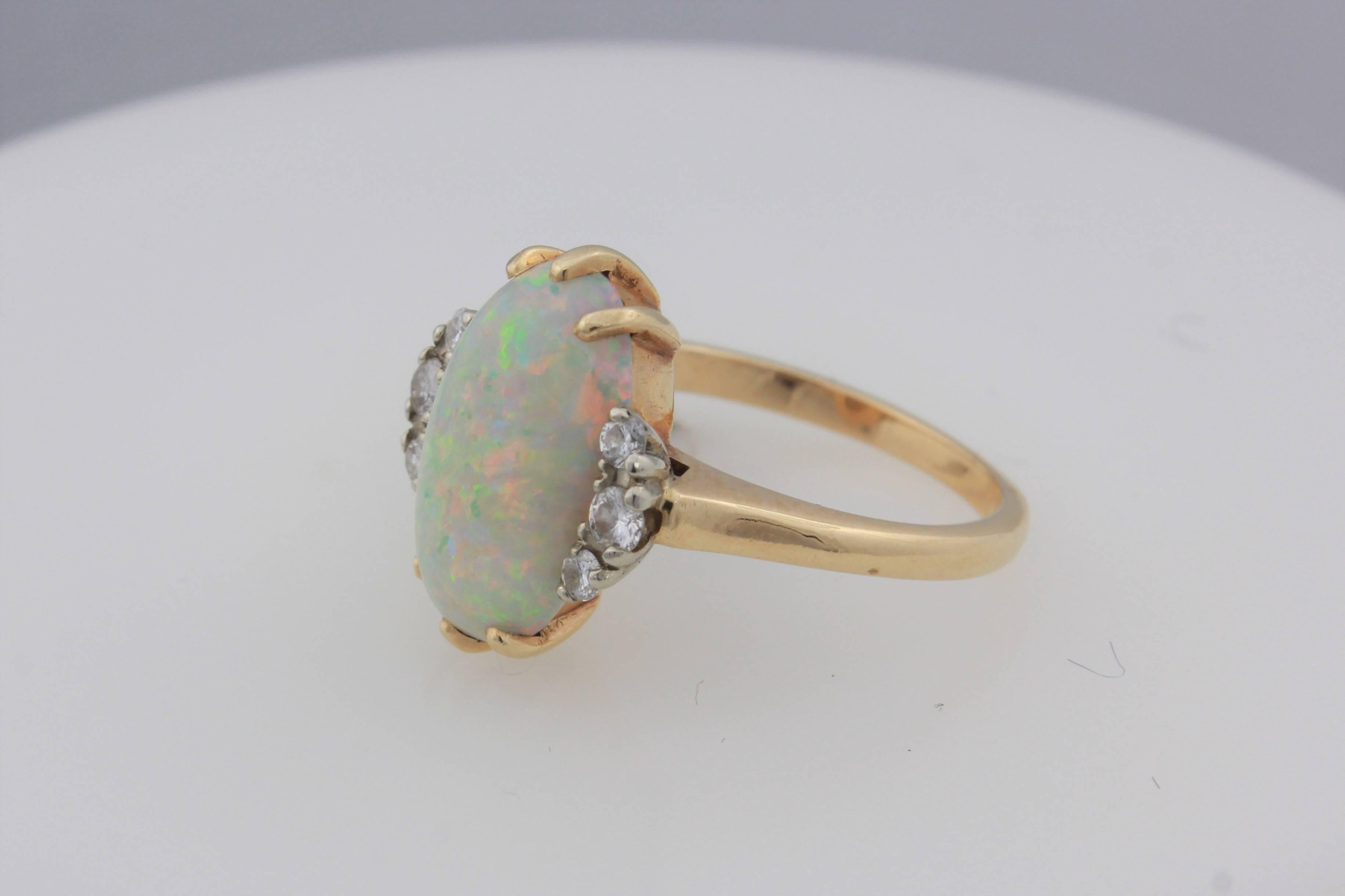 Contemporary Crystal Opal and Diamond Ring Set in 14 Karat Yellow Gold