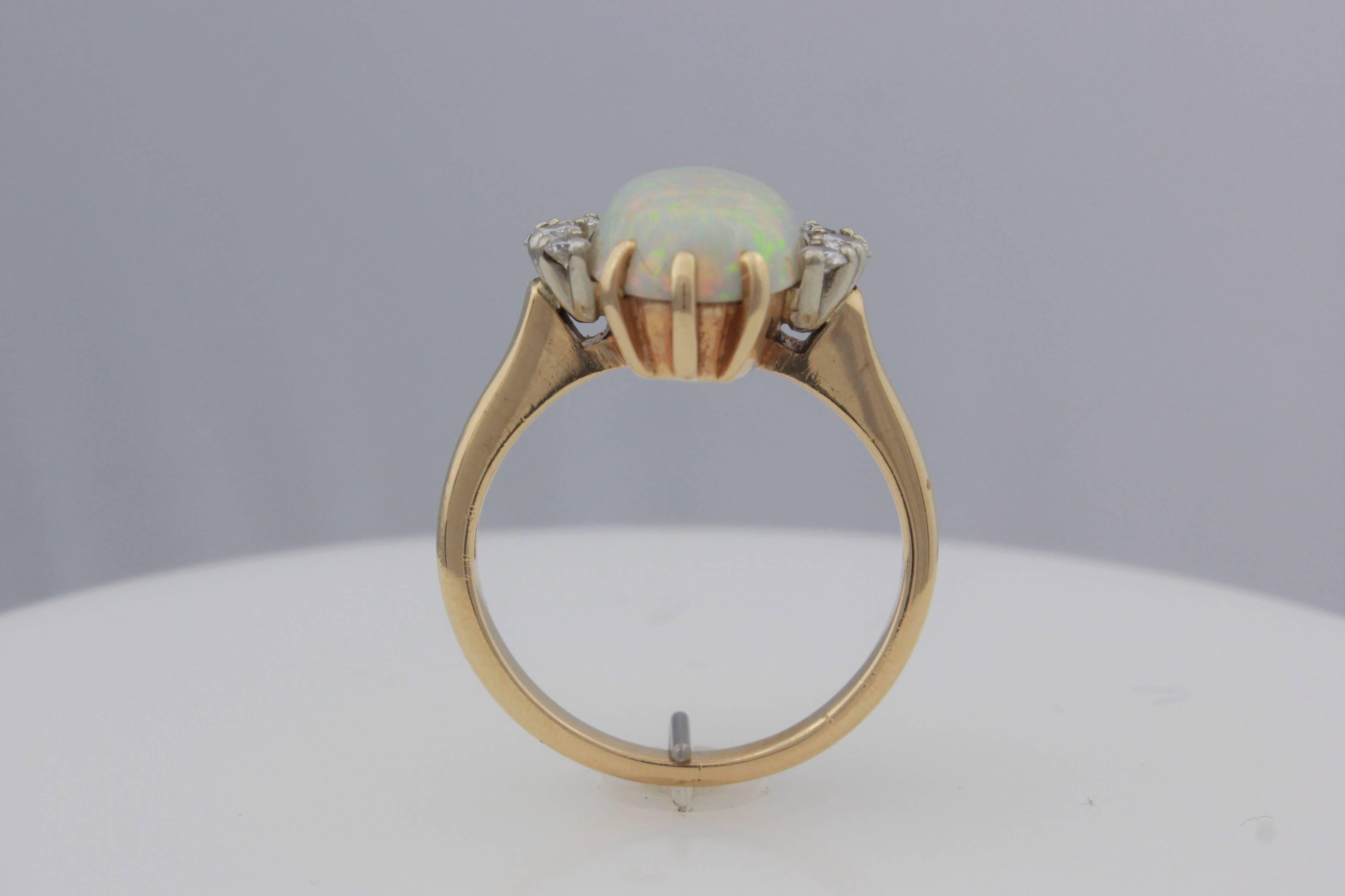 Oval Cut Crystal Opal and Diamond Ring Set in 14 Karat Yellow Gold