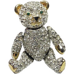 Crystal Pave Articulated Teddy Bear Brooch with Gold Tone Accents and Green Eyes