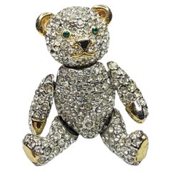 Crystal Pave Articulated Teddy Bear Brooch with Gold Tone Accents and Green Eyes
