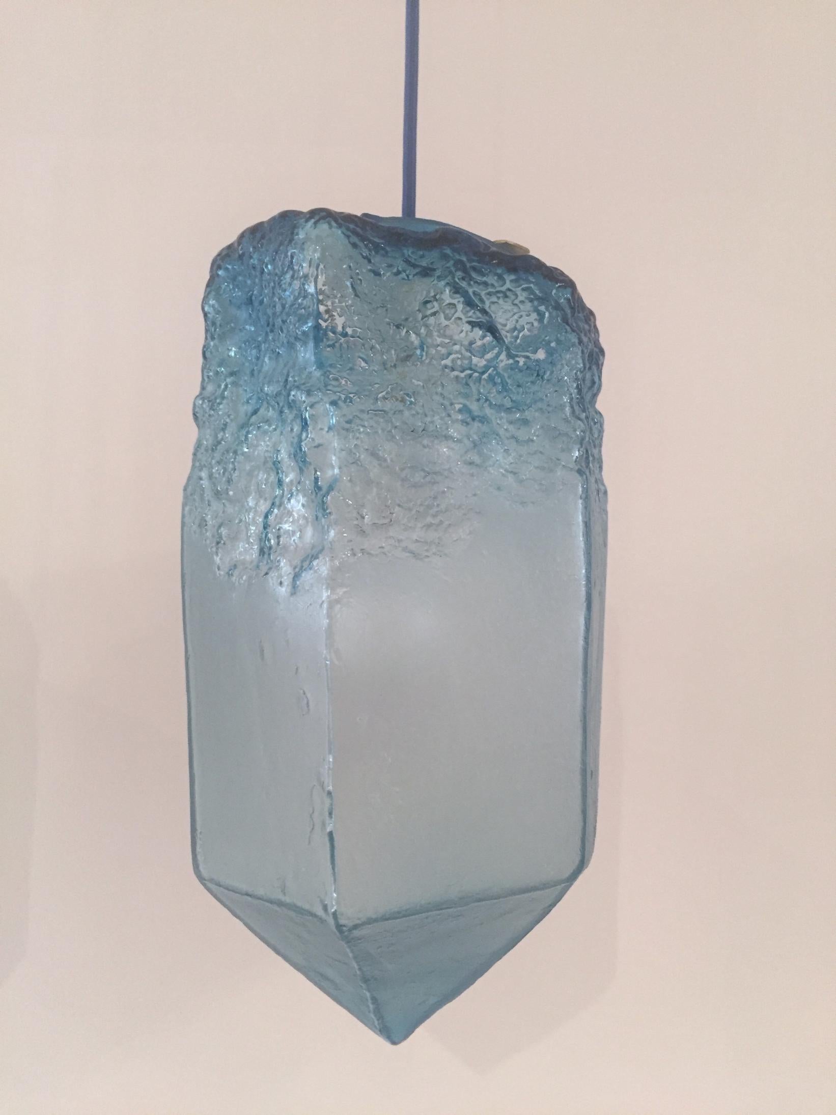 Crystal illuminated sculptural pendant in hand blown blue glass. Designed and made by Jeff Zimmerman, USA, 2016.

Limited number available. Please note that each item may differ slightly in color and shape.