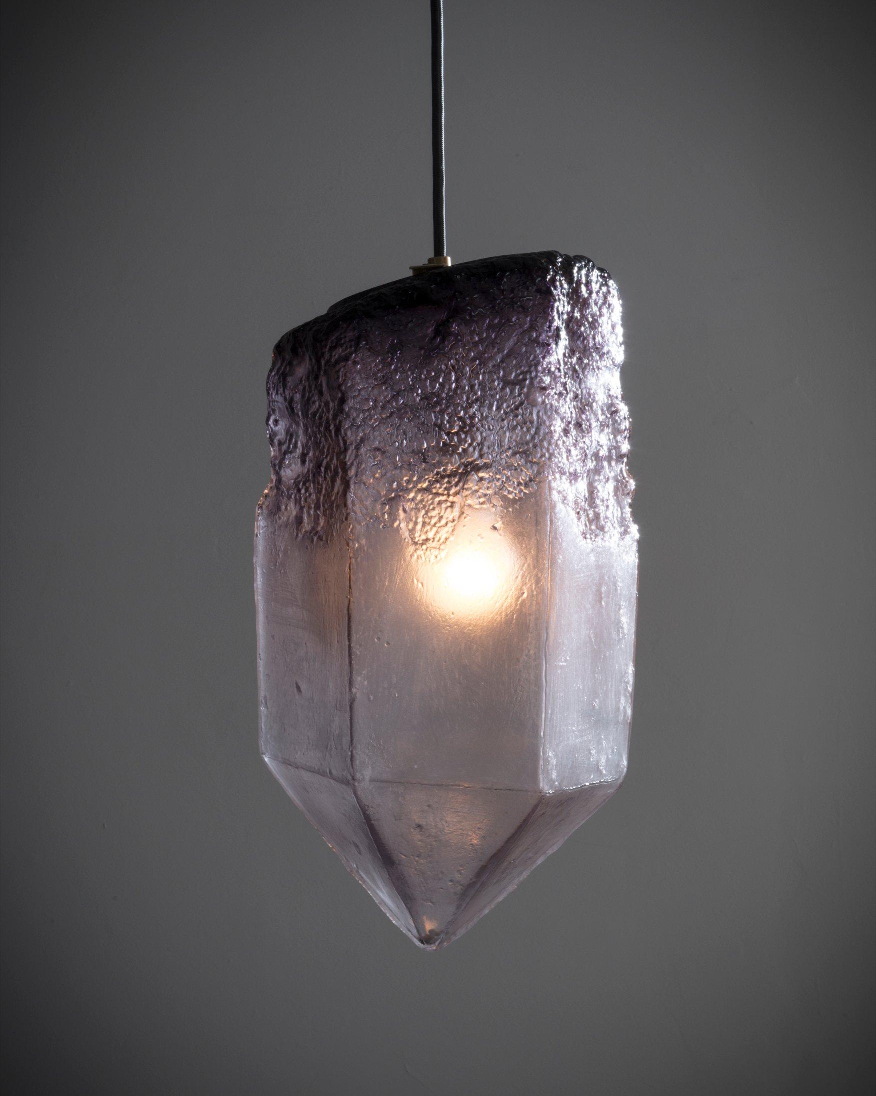 Crystal illuminated sculptural pendant in hand blown eggplant glass. Designed and made by Jeff Zimmerman, USA, 2016.

Limited number available. Please note that each item may differ slightly in color and shape.