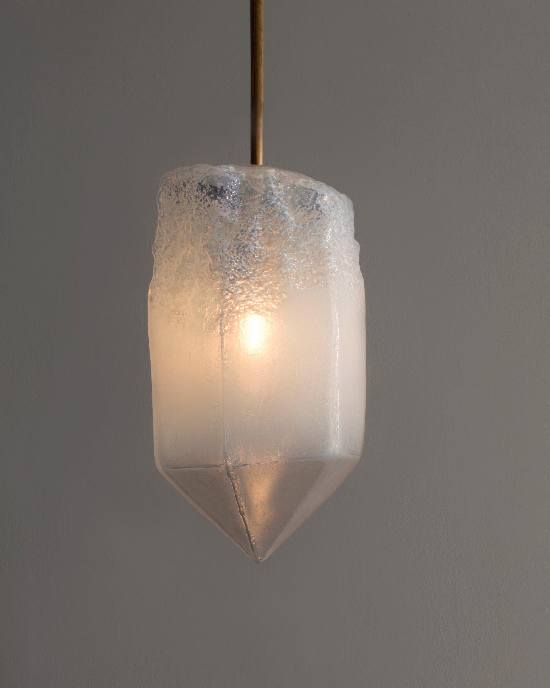 Crystal illuminated sculptural pendant in hand blown translucent white glass. Designed and made by Jeff Zimmerman, USA, 2017.

Limited number available. Please note that each item may differ slightly in color and shape.