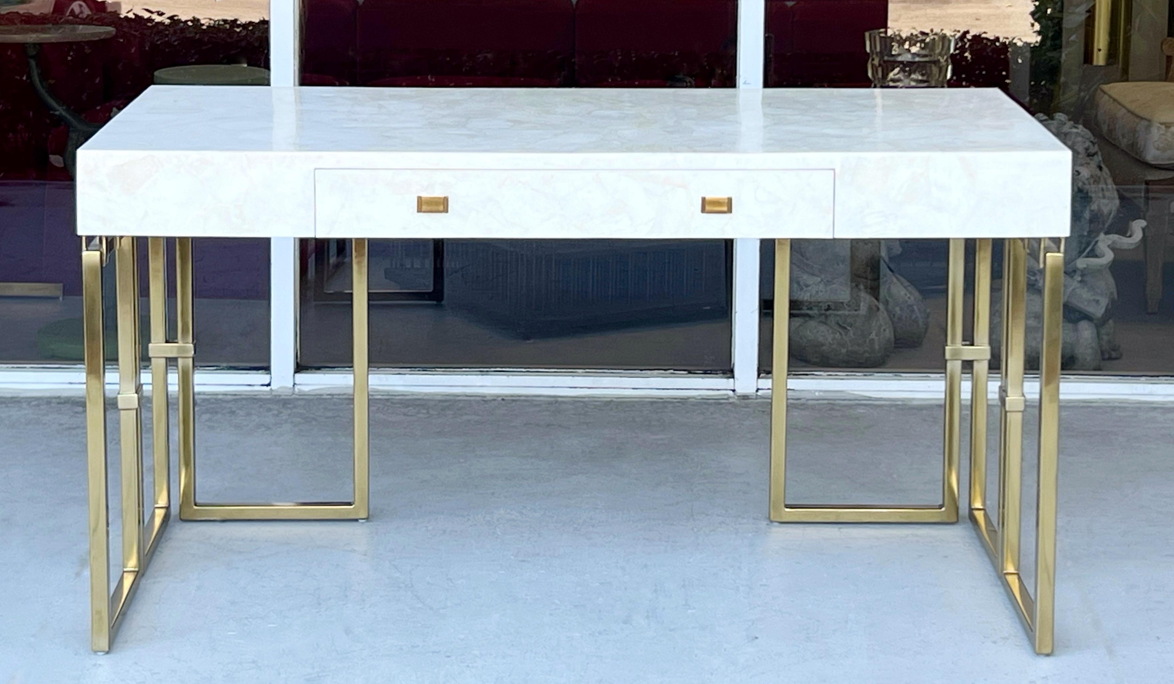 The top is crystal quartz, one drawer with brass pulls. Quite striking from any angle. 