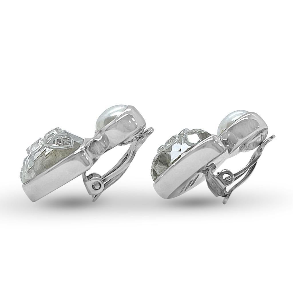 Crystal Quartz and Carved Stone Clip Back Earring

Stephen’s heart and passion go into each Dweck design, as the placement of each stone and its connection to nature has meaning. While bold and opulent, his jewelry has a weightless elegance for