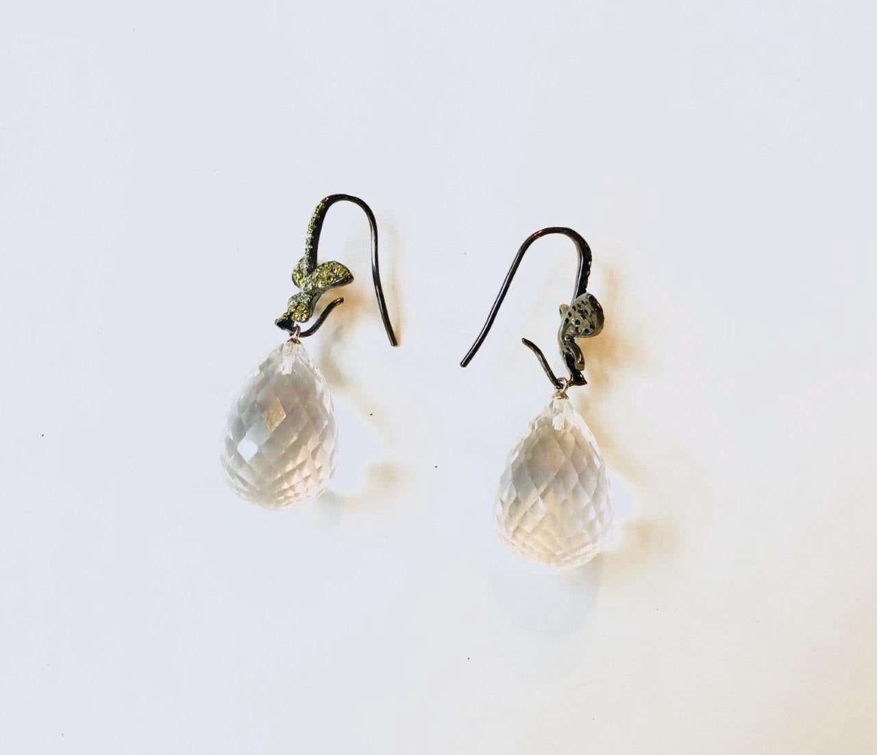 Amazing Rock Crystal or Pure Quartz featured stones dangle earrings.
These very much contemporary style pairs are made with 925 silver and zirconia.


