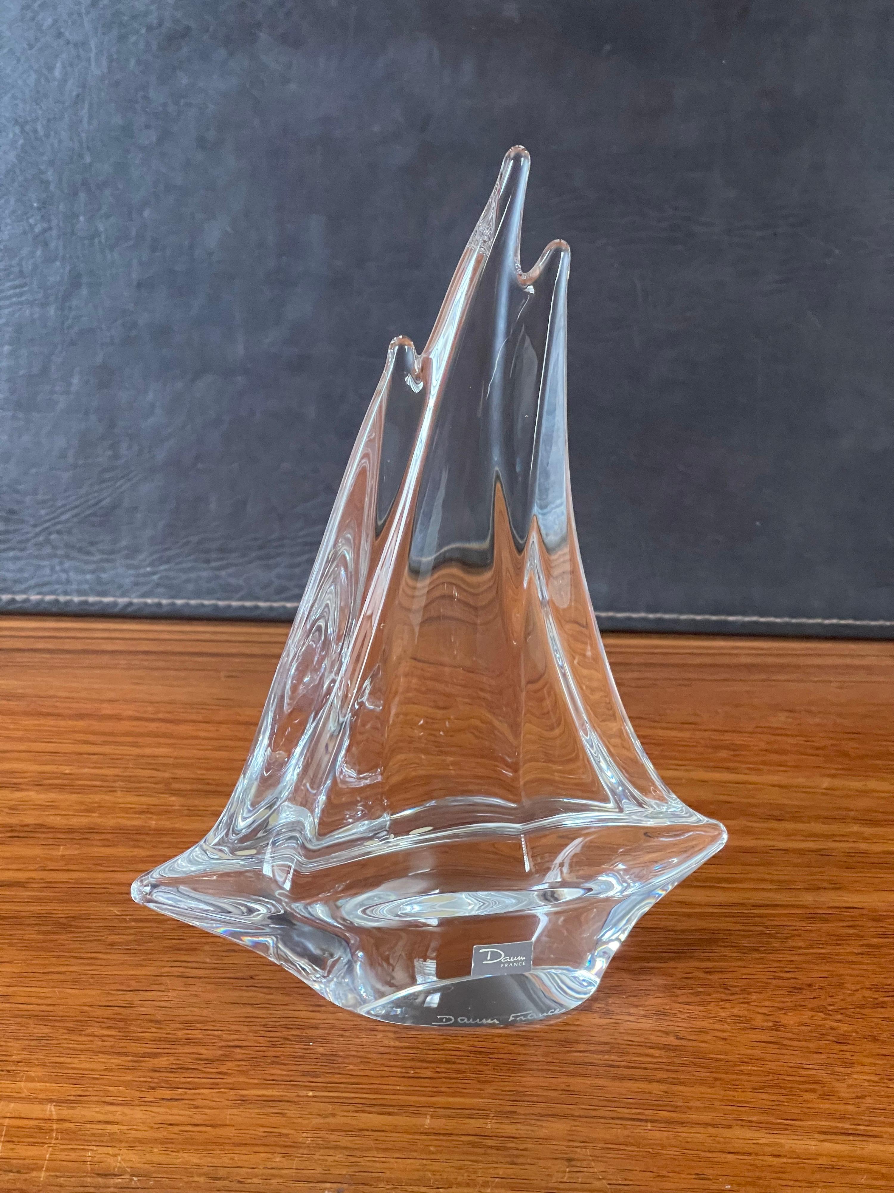 Gorgeous crystal sailboat sculpture by Daum, France, circa 2000s. The sculpture is in excellent condition with no chips or scratches and measures 7.5