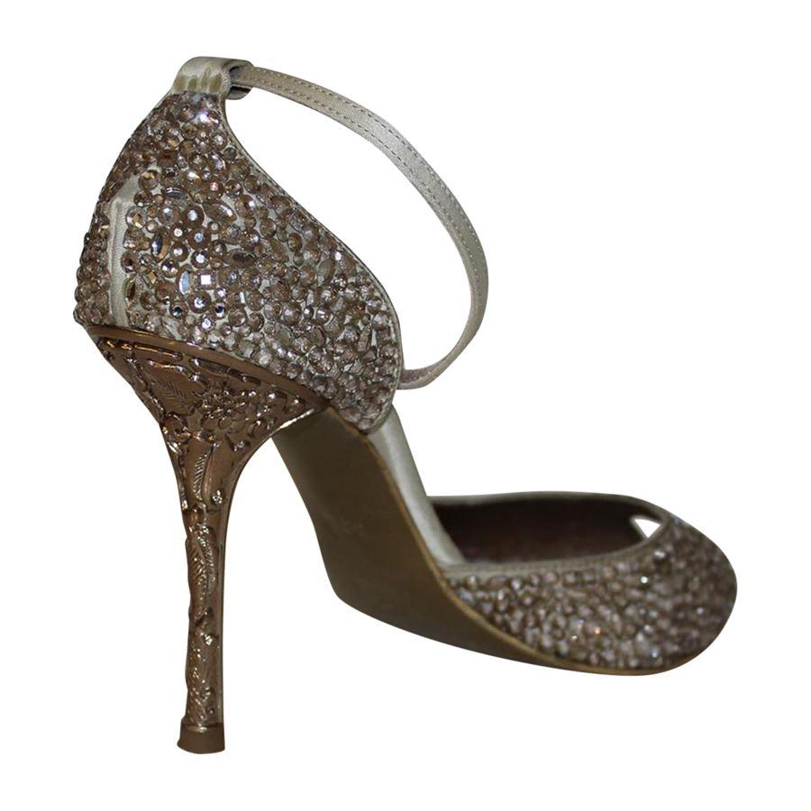 Canvas Beige color Covered with crystals Ankle closure Beautiful processed heel Heel high cm 10 (3.93 inches)
