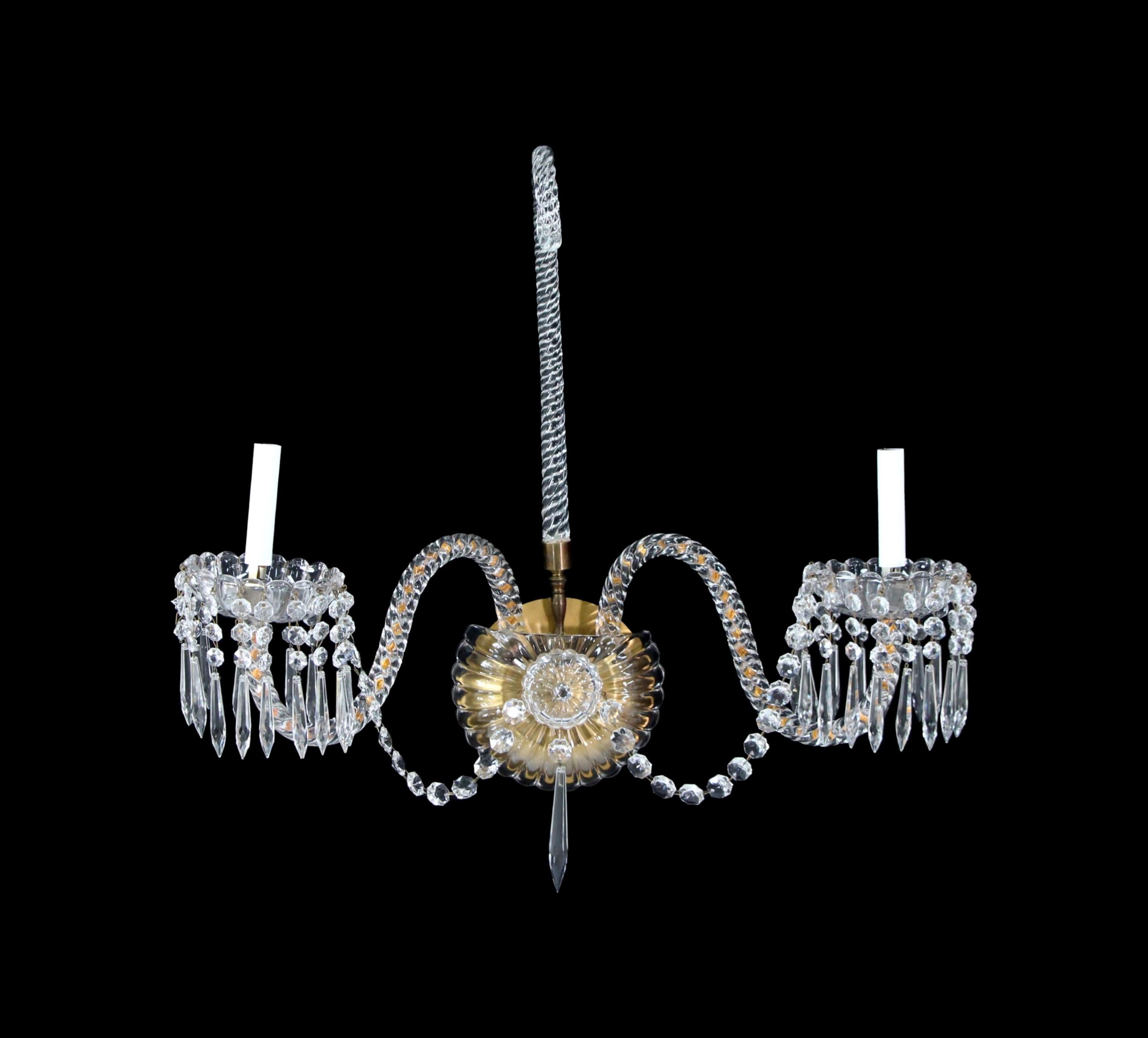 Crystal three arm wall sconce with an impressive amount of hanging crystals. This light is original to Hotel Pennsylvania which opened on January 25, 1919 in New York City. Cleaned and rewired. Small quantity available at time of posting. Priced