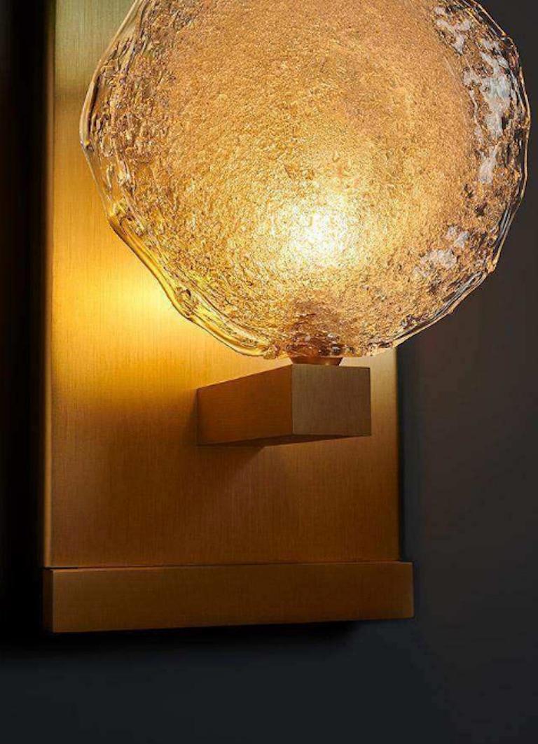 The Crystal Shell Luxe sconces features our signature blown-glass and decorative brass backplates.

Glass dimensions: 5
