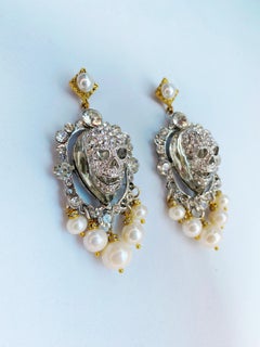 Crystal skull and freshwater pearl earrings by Sebastian Jaramillo
