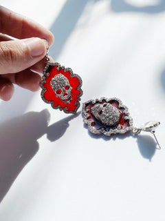 Crystal skull earrings by Sebastian Jaramillo