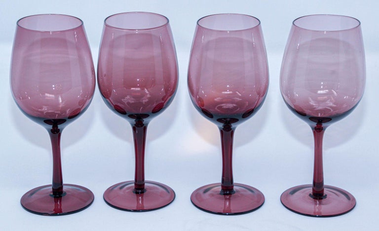 https://a.1stdibscdn.com/crystal-stemware-wine-glasses-amethyst-color-1980s-barware-for-sale-picture-2/f_9068/f_336573821680700256986/1_Vintage_Amethyst_Footed_drinking_glasses_water_or_wine_3_master.jpeg?width=768