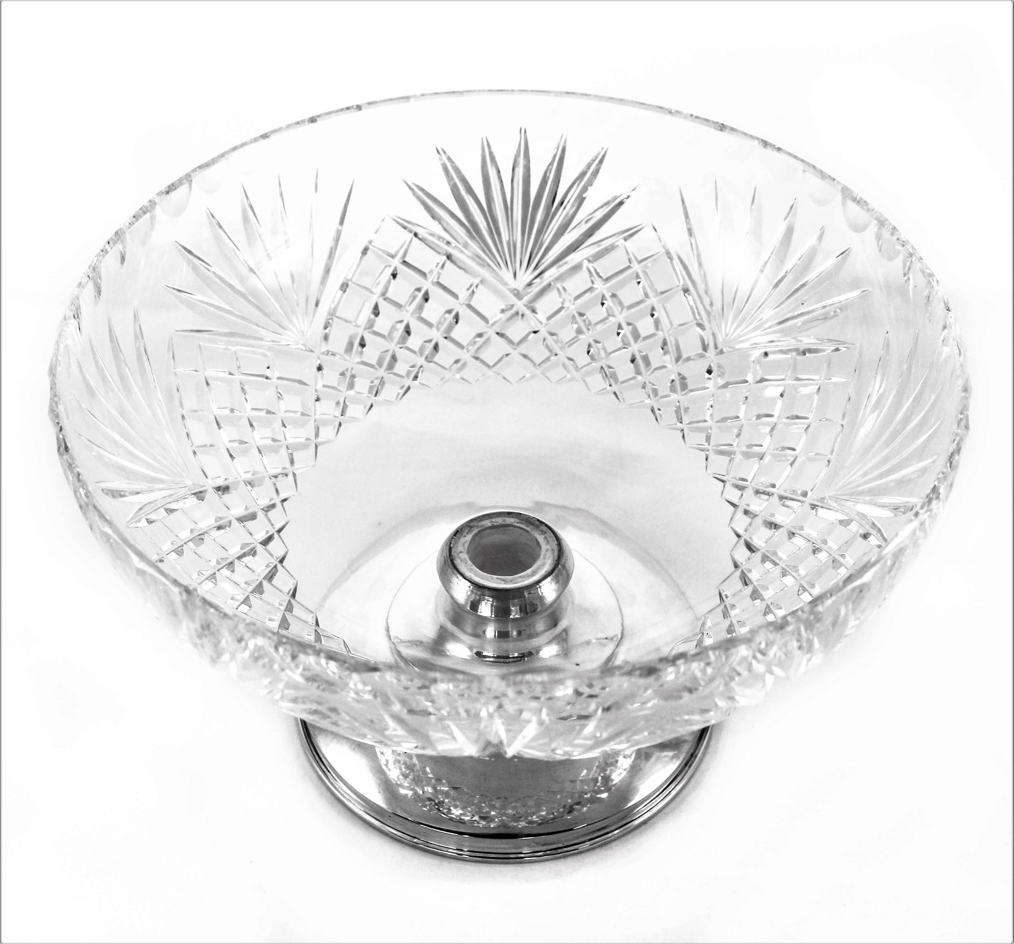 Famous for their cut-glass designs, Hawkes was the premiere glass blower in the late 19th and early 20th century. Of note was there mix of crystal and sterling silver. This particular piece is done in the Pineapple pattern. A series of eight