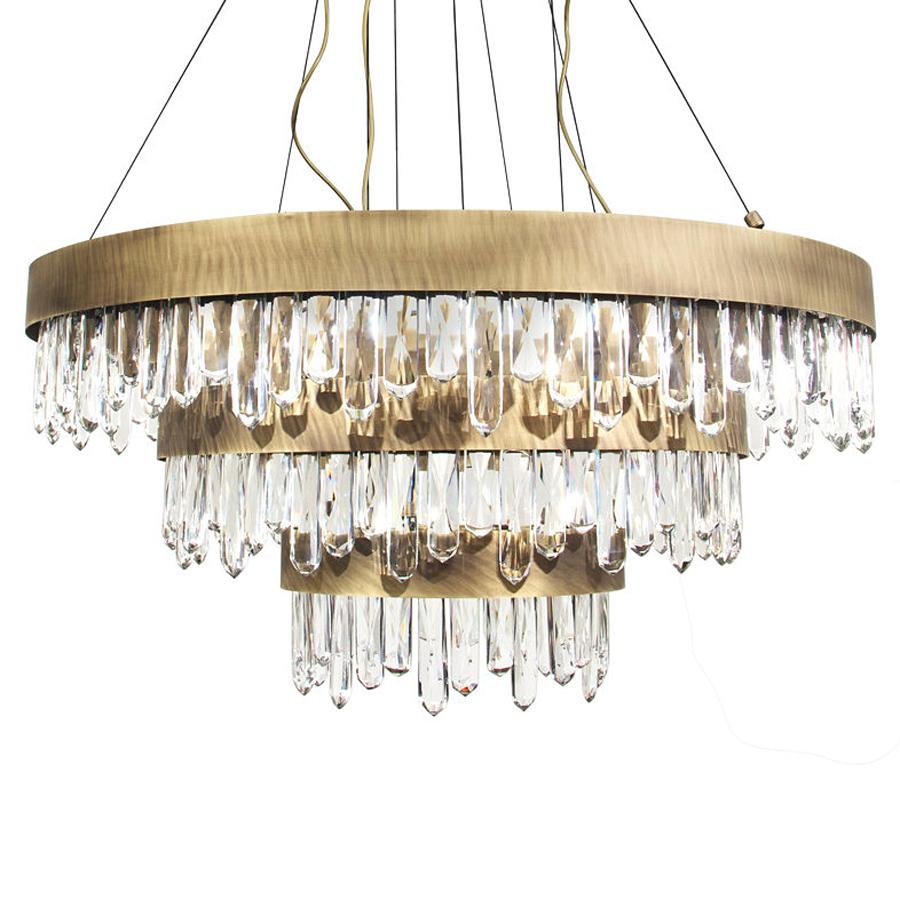 Chandelier crystal sticks triple with carved quartz
crystal sticks. Structure in solid brass in antique brushed
finish. With led light included inside the ring structure.
Also available in single ring crystal sticks chandelier
and crystal sticks