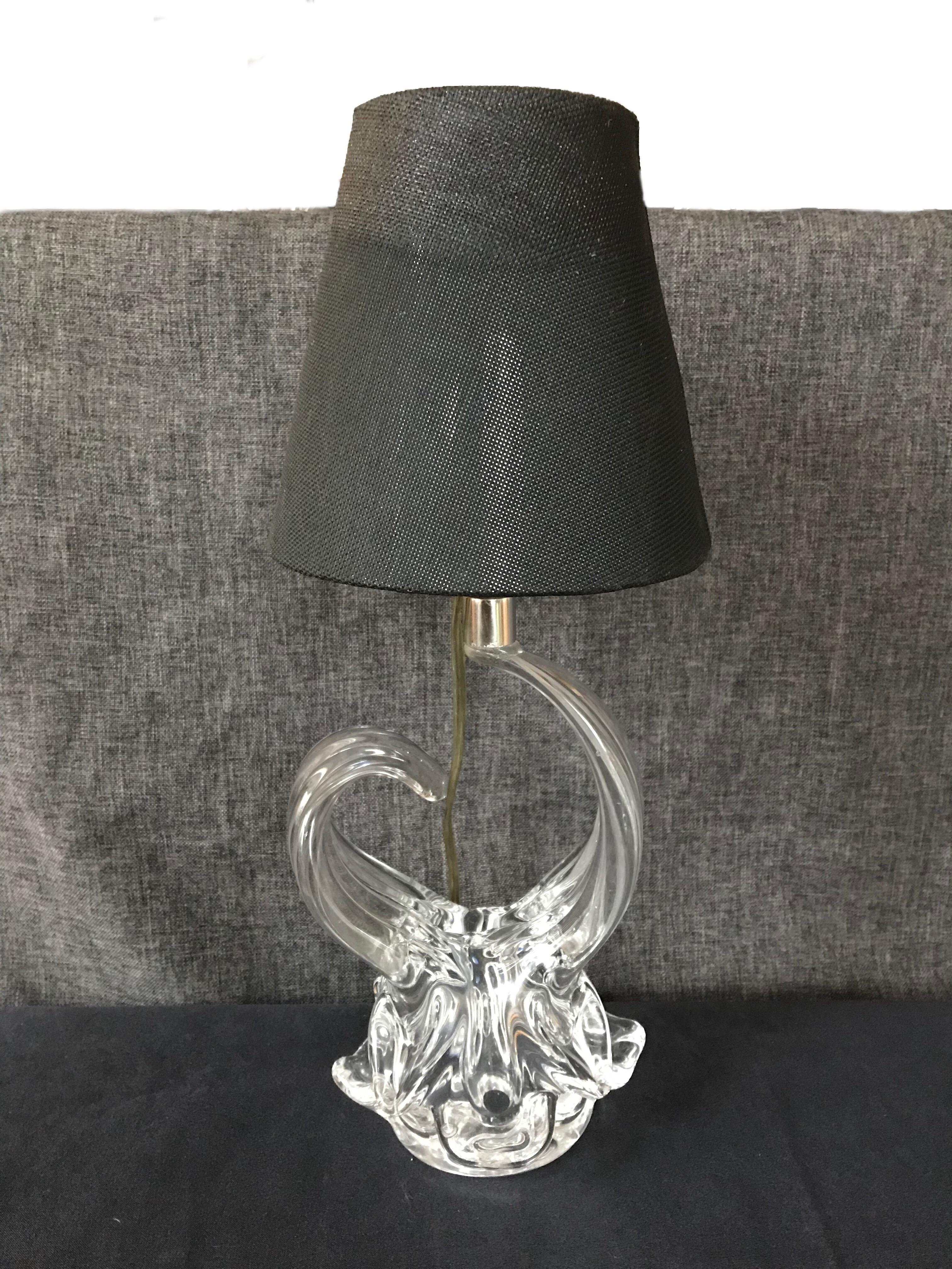 Crystal table lamp by Schneider, France 1950s.
D 14 x h 33 cm
Measures With black lampshade: 13 x P 11 x H 25.5 cm
Without lampshade D 14 x H 13 cm.