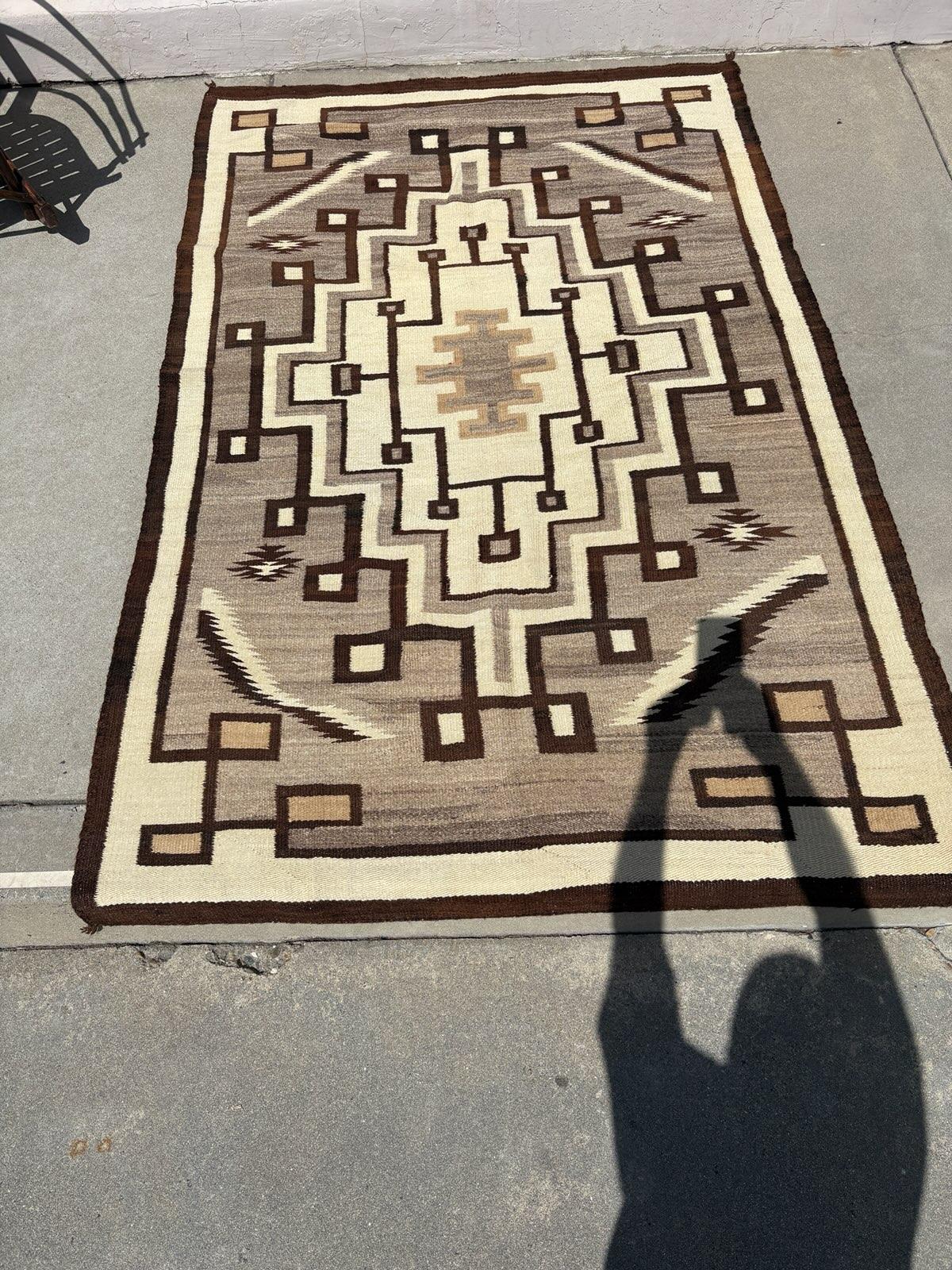 Amazing hand woven  Navajo Indian weaving rug in very fine condition.Comes from a private estate in Santa Barbara.This is a Crystal Trading Post Navajo weaving.