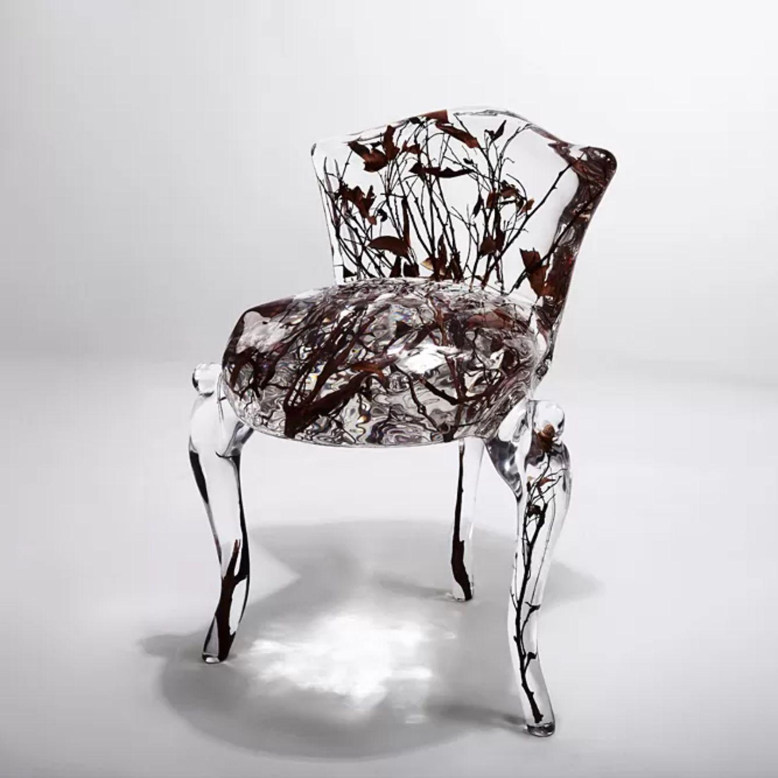 Crystal Tufted Armchair by Dainte
Dimensions: D 50 x W 47 x H 66 cm.
Materials: Crystal. 

Designed to catch the eye, this chair is so much more than impressive. The fine, clear crystal mixed with acrylic is radiant as it enchases the natural wooden