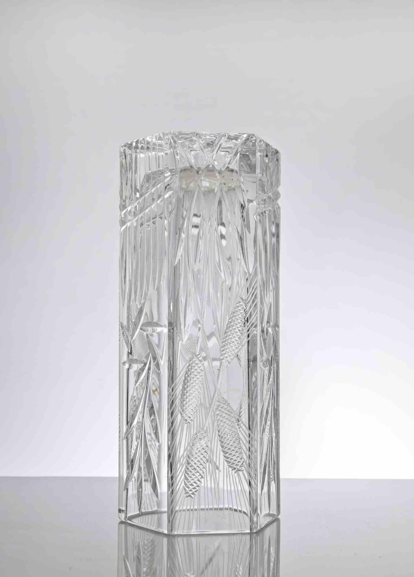Jarrón de cristal vintage realizado por una manufactura europea en los años 70.

Motivos decorativos con pinchos.

Muy buen estado.