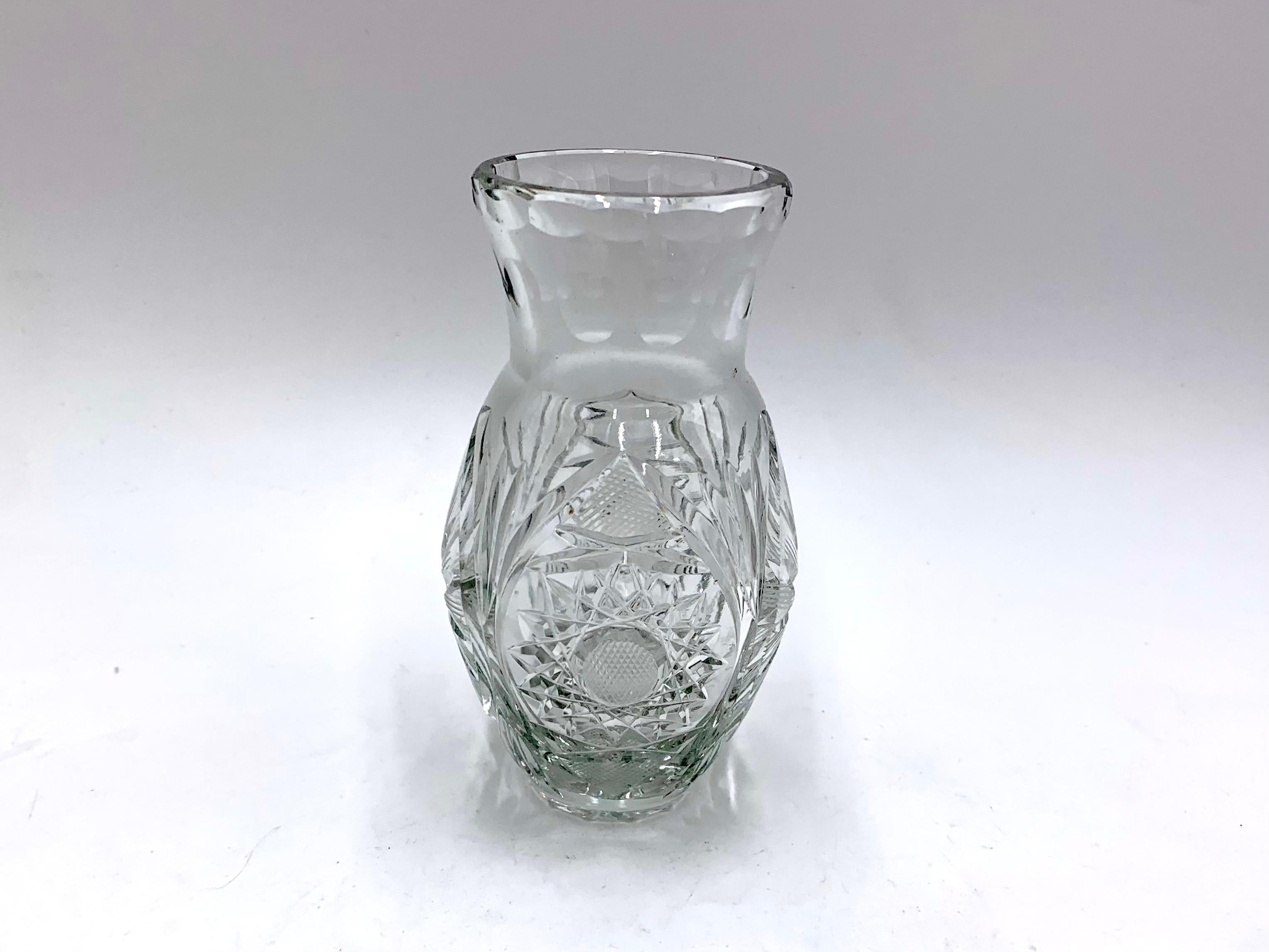 Vase made of crystal. 
The vase was produced in Poland in the 1960s and 1970s.
Vase in very good condition
Measures: Height 14cm / diameter 6 cm.