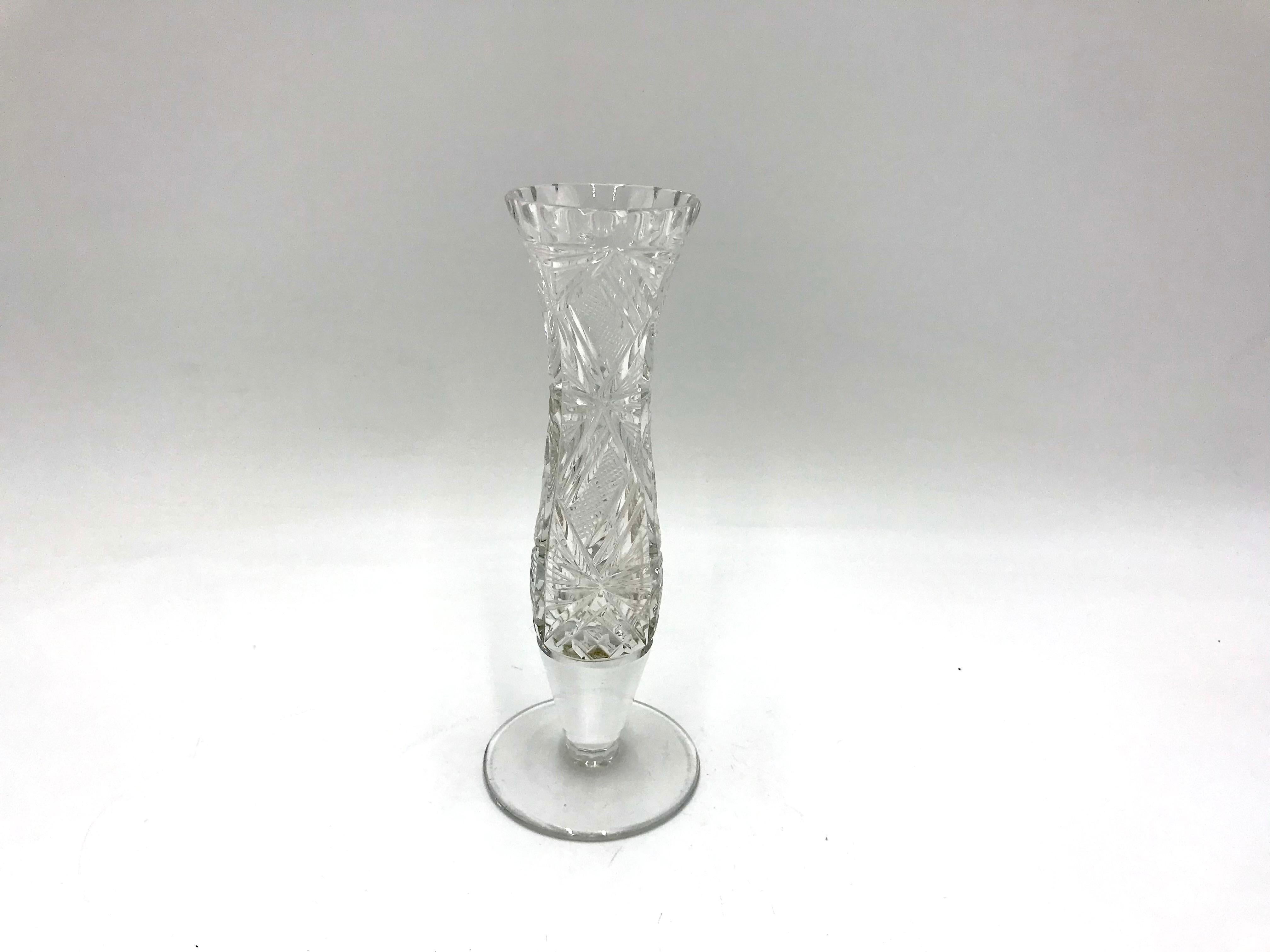 Vase made of crystal. 
The vase was produced in Poland in the 1960s and 1970s.
Vase in very good condition
Measures: Height 18cm / diameter 5cm.