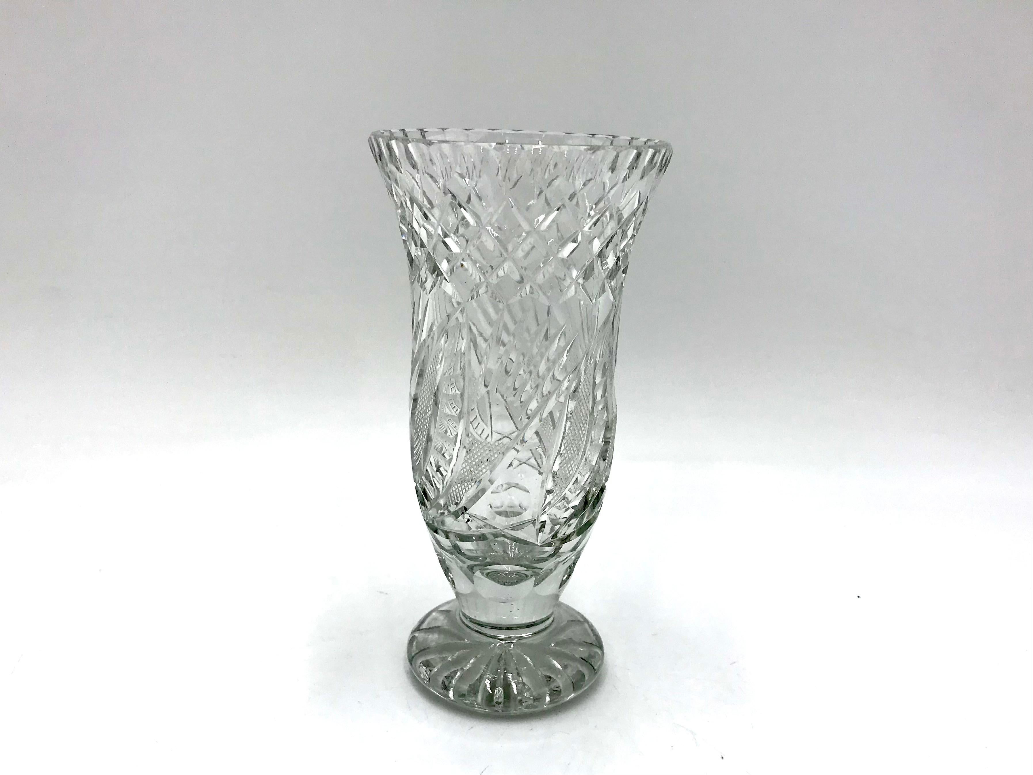 Vase made of crystal. 
The vase was produced in Poland in the 1960s and 1970s.
Vase in very good condition
Measures: Height 15cm / diameter 7cm.