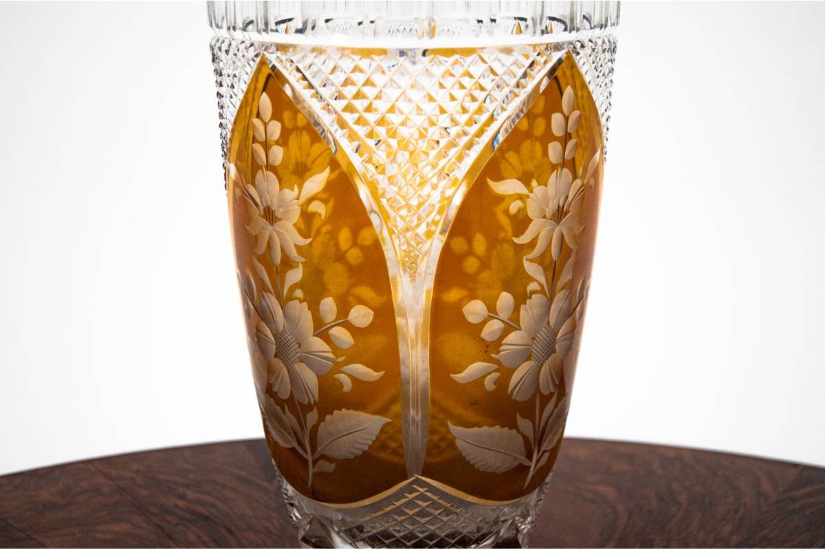 Transparent / Honey colored crystal vase with floral motif

Made in Poland during 1970s

Very good condition, no damage.

Dimensions: Height 24 cm, diameter at the outlet 17 cm.