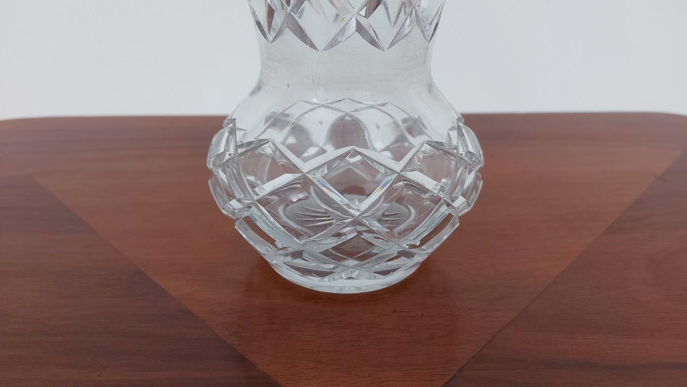 Vase made of crystal. The vase was produced in Poland in the 1960s and 1970s.

Good condition of the vase, seen signs of use-scratches.





