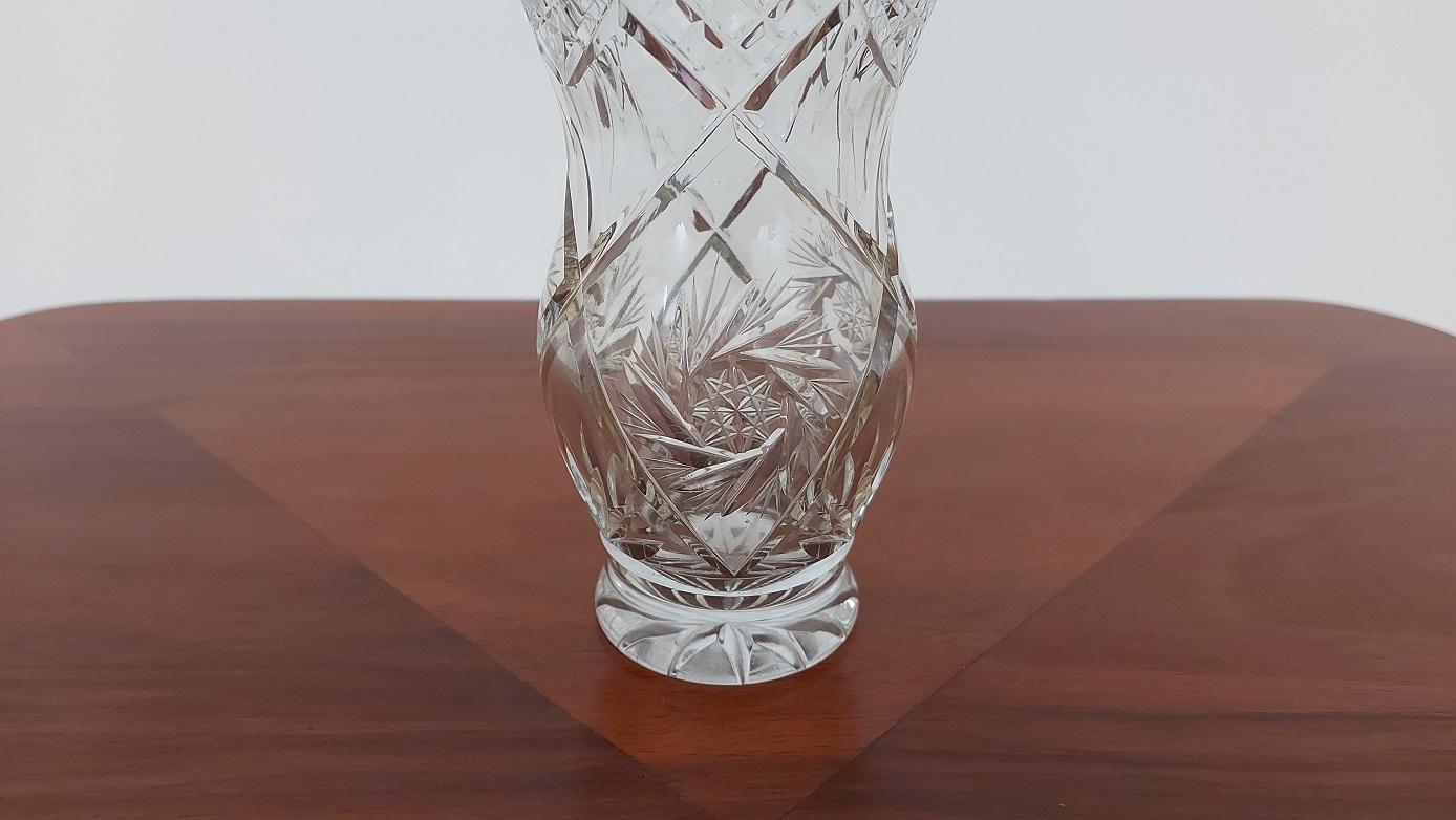 A small vase made of crystal. The vase was produced in Poland in the 1960s and 1970s.

Measures: Height 16 cm / diameter 10.5 cm.