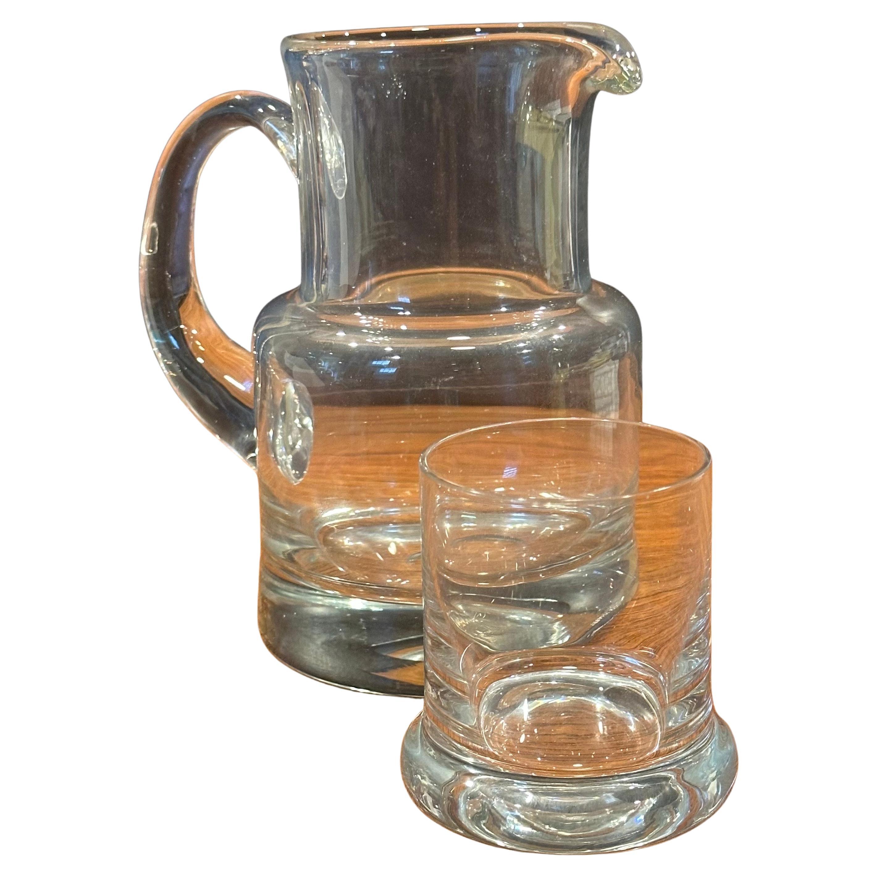 Gorgeous crystal water carafe and cup by Tiffany & Co. circa 1990's.  The set is in very good vintage condition with no chips or cracks  and measures 4.5