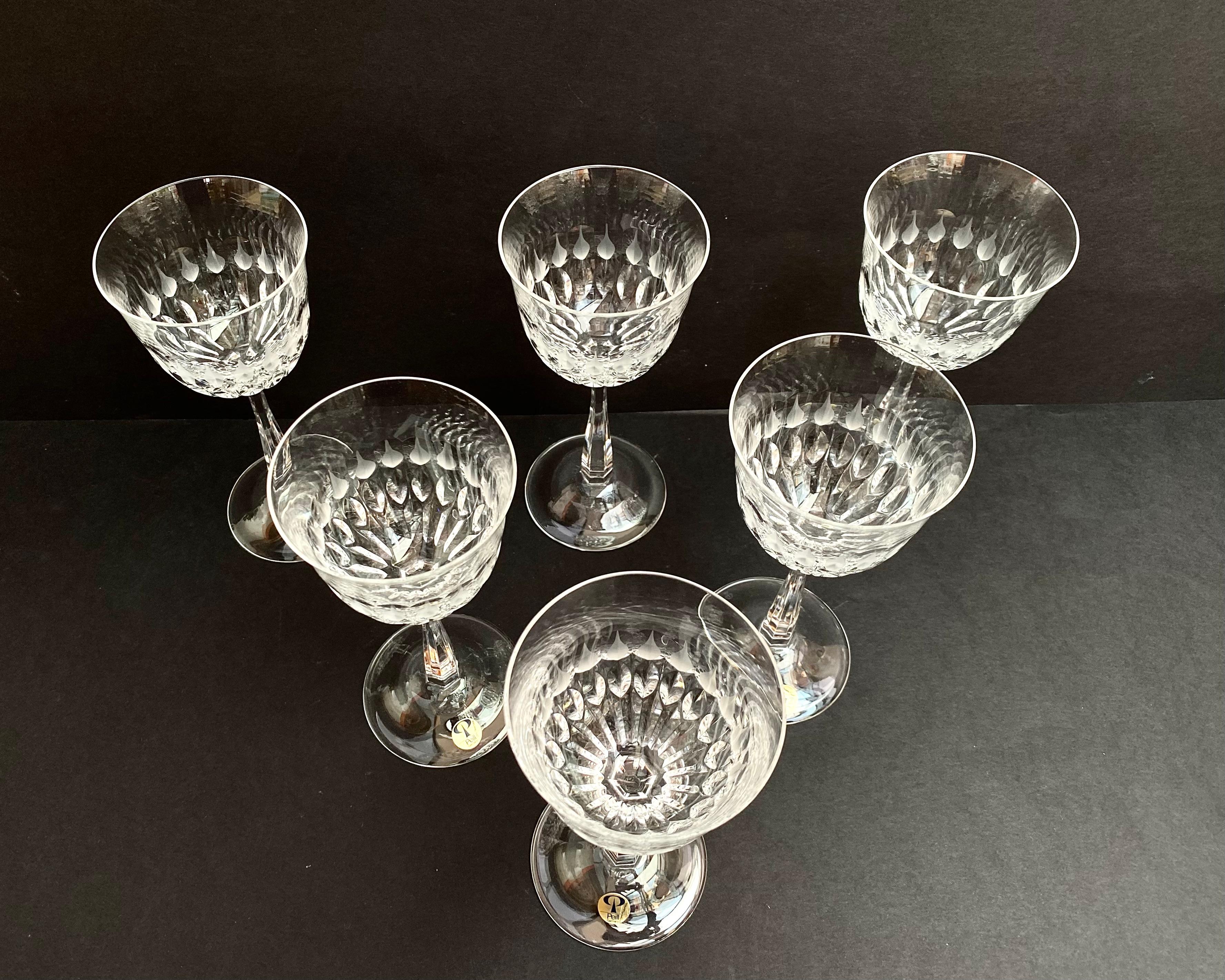 Beautiful Vintage set of 6 crystal wine/champagne glasses.

  Produced in Germany, by the famous manufacturer Peill Glasses, in the 70- 80s. Colorless cut 24% Lead Crystal Wine Glasses. Due to it, the glasses acquire a unique melodic silver