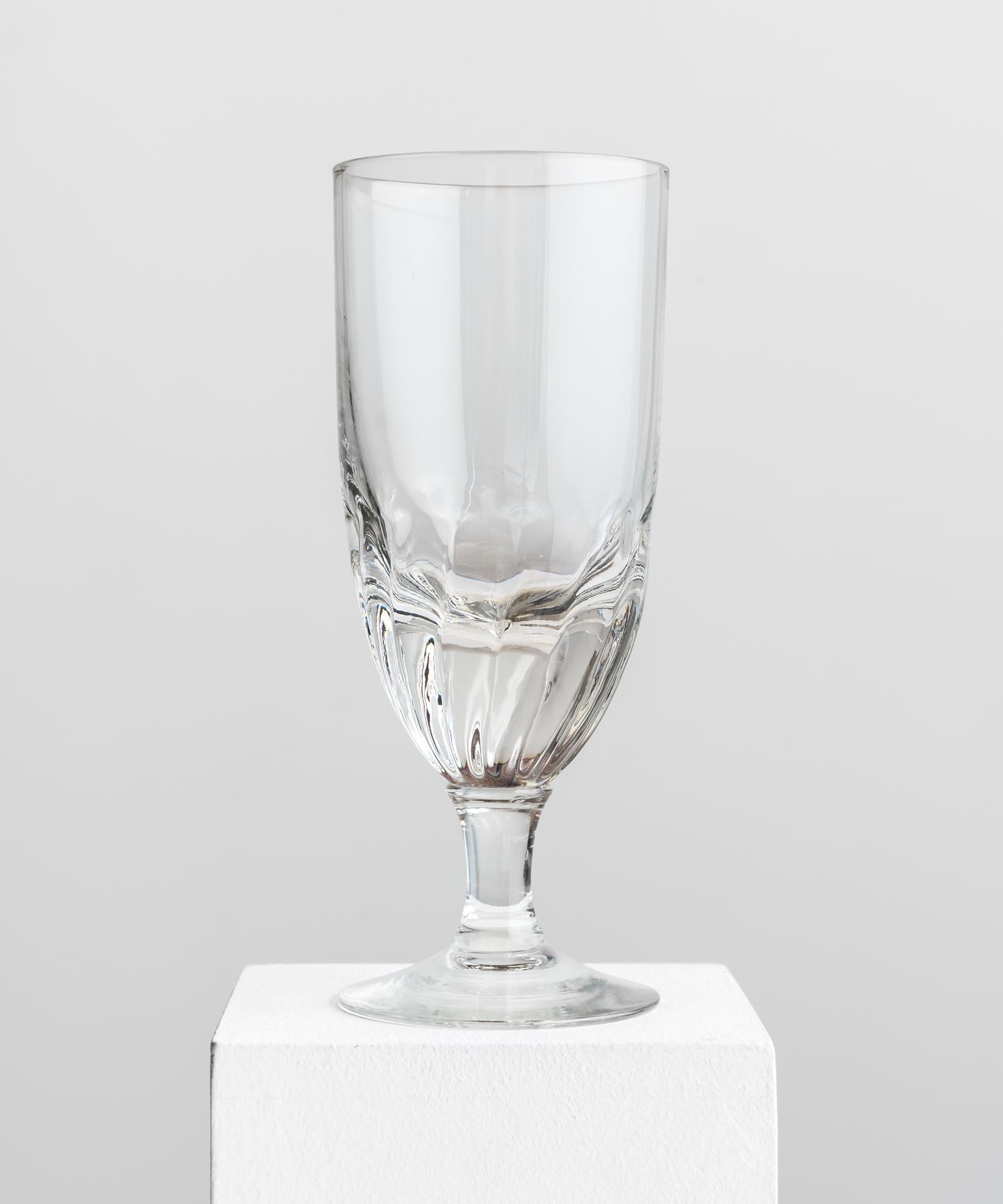 Crystal wine glasses, circa 1860

Elegant forms with solid base and detailed bottom half.