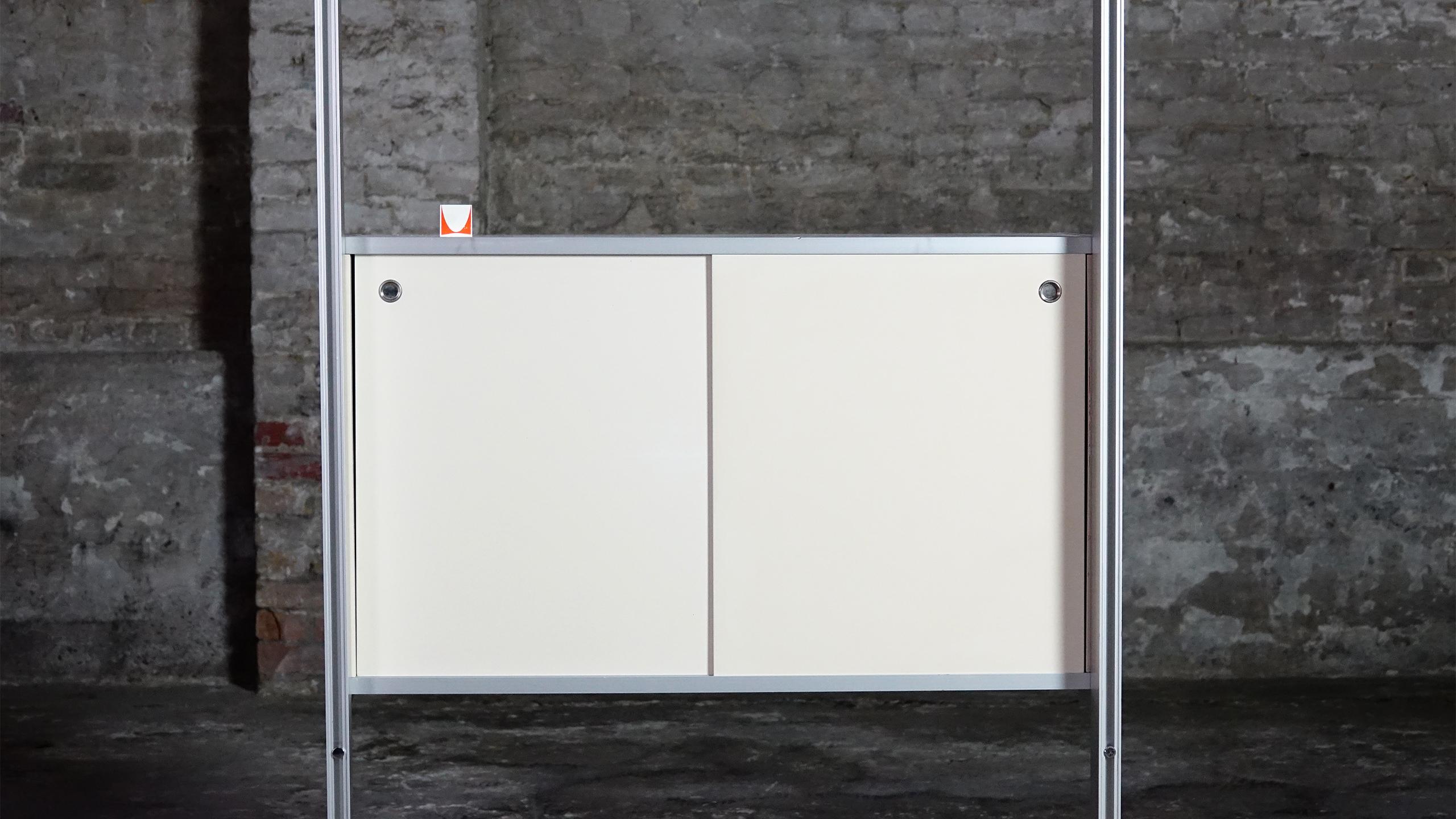 CSS Shelf by George Nelson for Herman Miller, 1965

 Vintage modular wall unit crafted in white lacquered wood and Vintage modular wall unit crafted in white lacquered wood and aluminum. This wall shelf model known as Comprehensive storage system