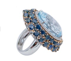ct 45, 50 Blue Topaz Diamond and ct 12, 88 Sapphire Gold Ring