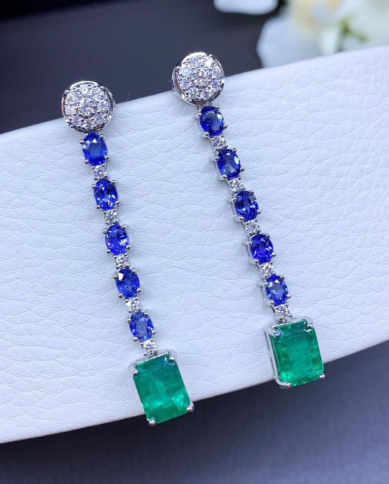 Contemporary Certified 8, 50 Ct Zambia Emeralds, Ceylon Sapphires and Diamonds on Gold For Sale