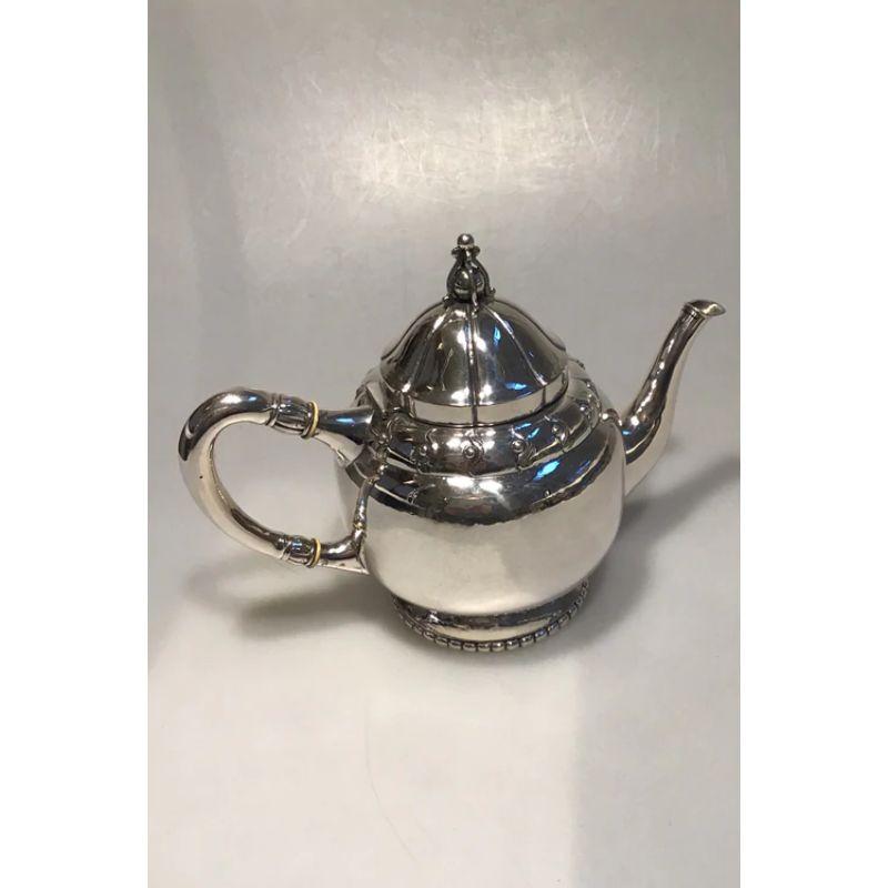 CTC / Danish work silver teapot (1919) 

Measures H 18.5 cm (7 9/32 in) Weight 565 gr / 19.95 oz.