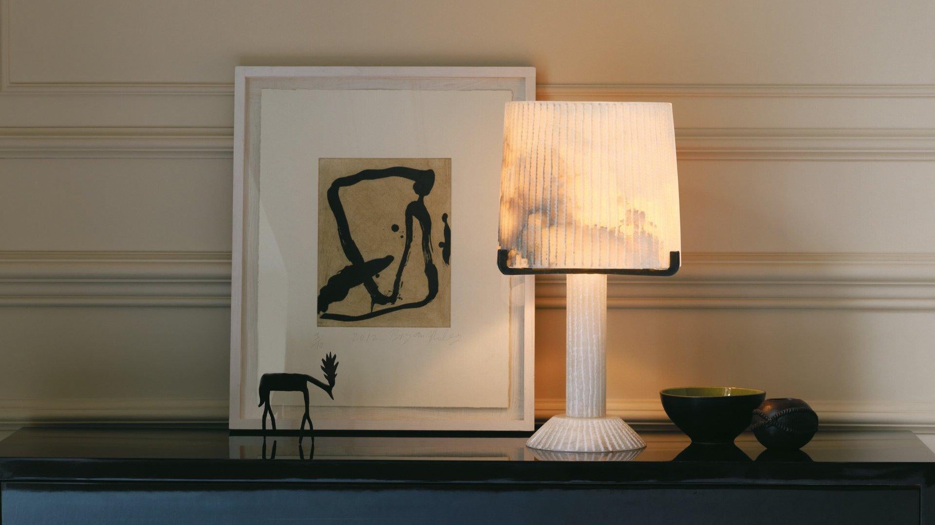 A gorgeous table lamp, made of alabaster reminiscent of an ancient Greek city, the Acropolis is masterful in its execution.

The unique veining of the alabaster means that no two lights are the same. Some are almost white whilst others have grey