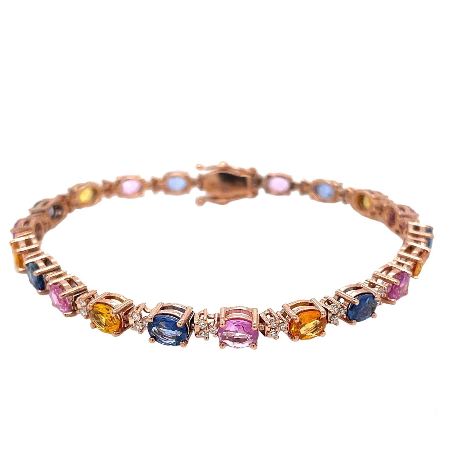 Fabuleux bracelet en or rose massif de 9 k et serti de 10,7 carats de saphirs roses, jaunes et bleus naturels de taille ovale, pesant 0,50 carat chacun.  et avec des diamants étincelants, poids total 0,50 ct (pureté VS, couleur G).
Cette pièce est