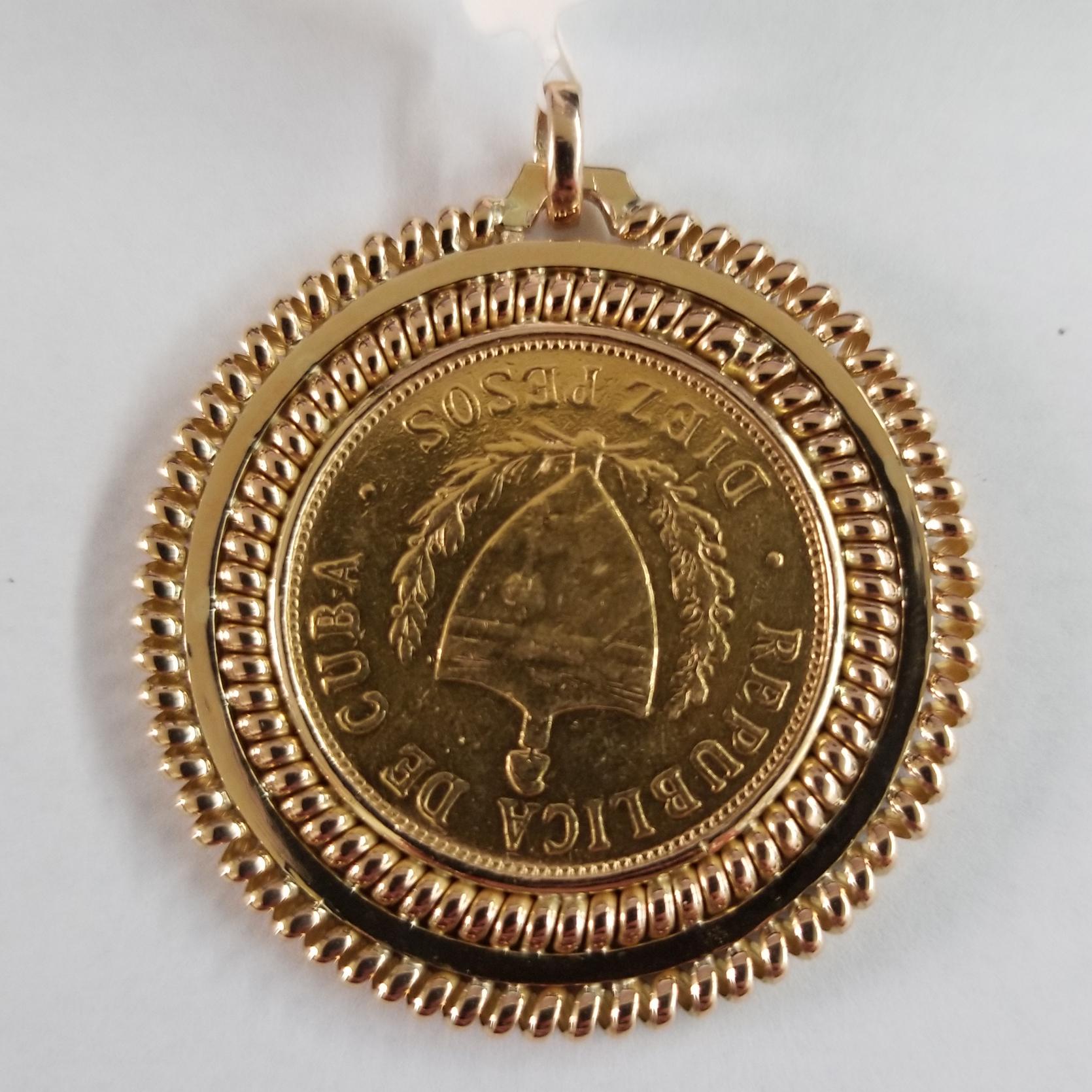 22 Karat Yellow Gold Cuban 10 (Diez) Pesos Coin from 1916 Set in an 18 Karat Yellow Gold Frame with Curl Design on Exterior.  Finished Weight is 28.2 Grams.
