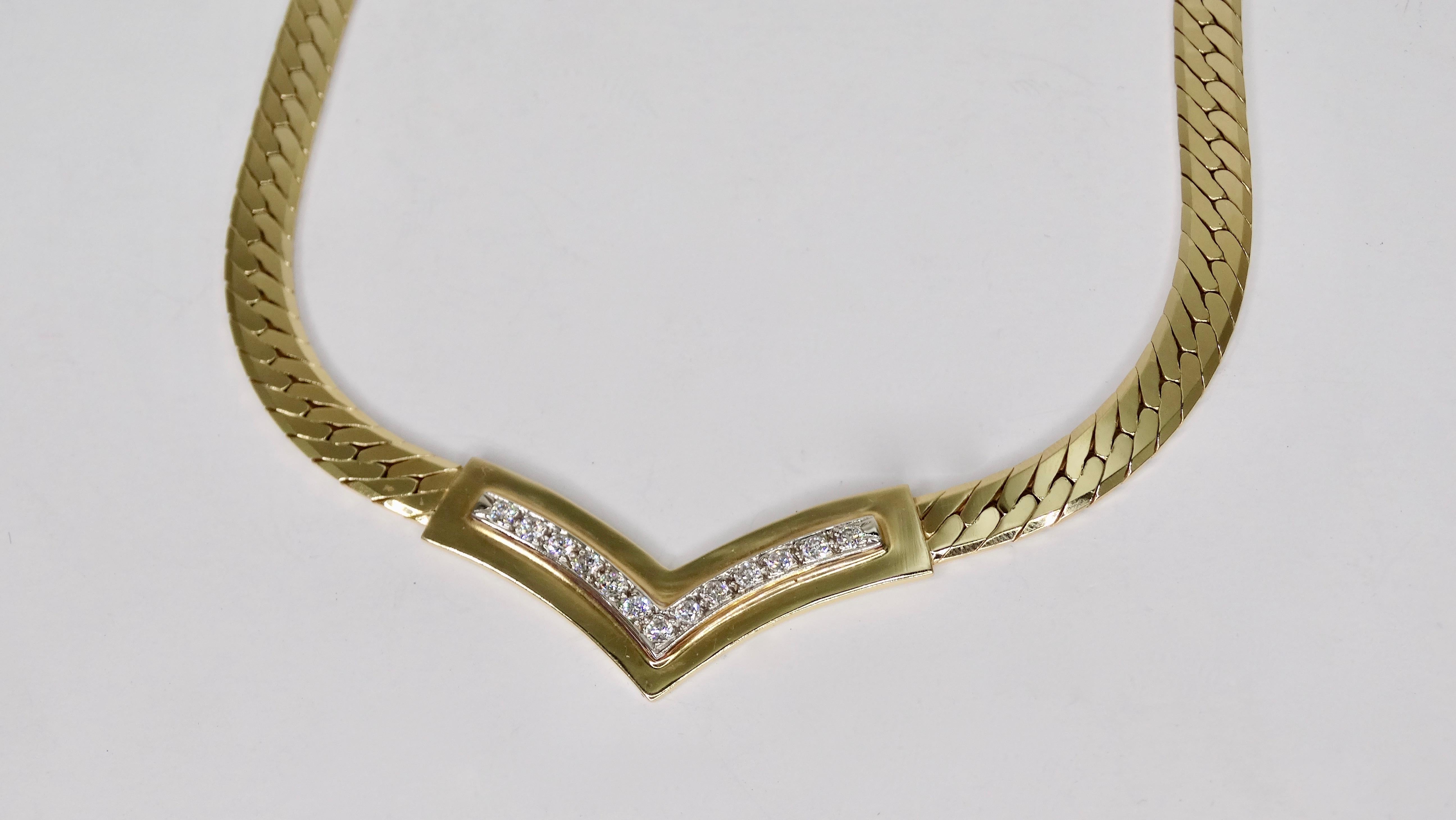 Gorgeous 14k gold necklace with a cuban link chain and decorative v-shaped pedant with 13 Diamonds. Stamped 14k and weighs 42.03g. Perfect to wear for a night out with your favorite vintage Gucci dress or layered up with your vintage concert tees.