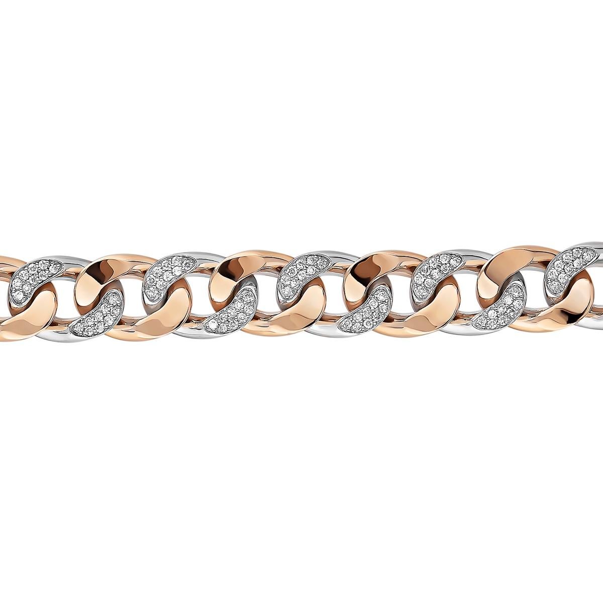 We are introducing our stunning diamond Cuban bracelet! 
This unisex bracelet is handcrafted with 18K white and rose gold and features 1.7-carats of VS and E color diamonds.
Whether you're dressing up for a special occasion or just looking to add a