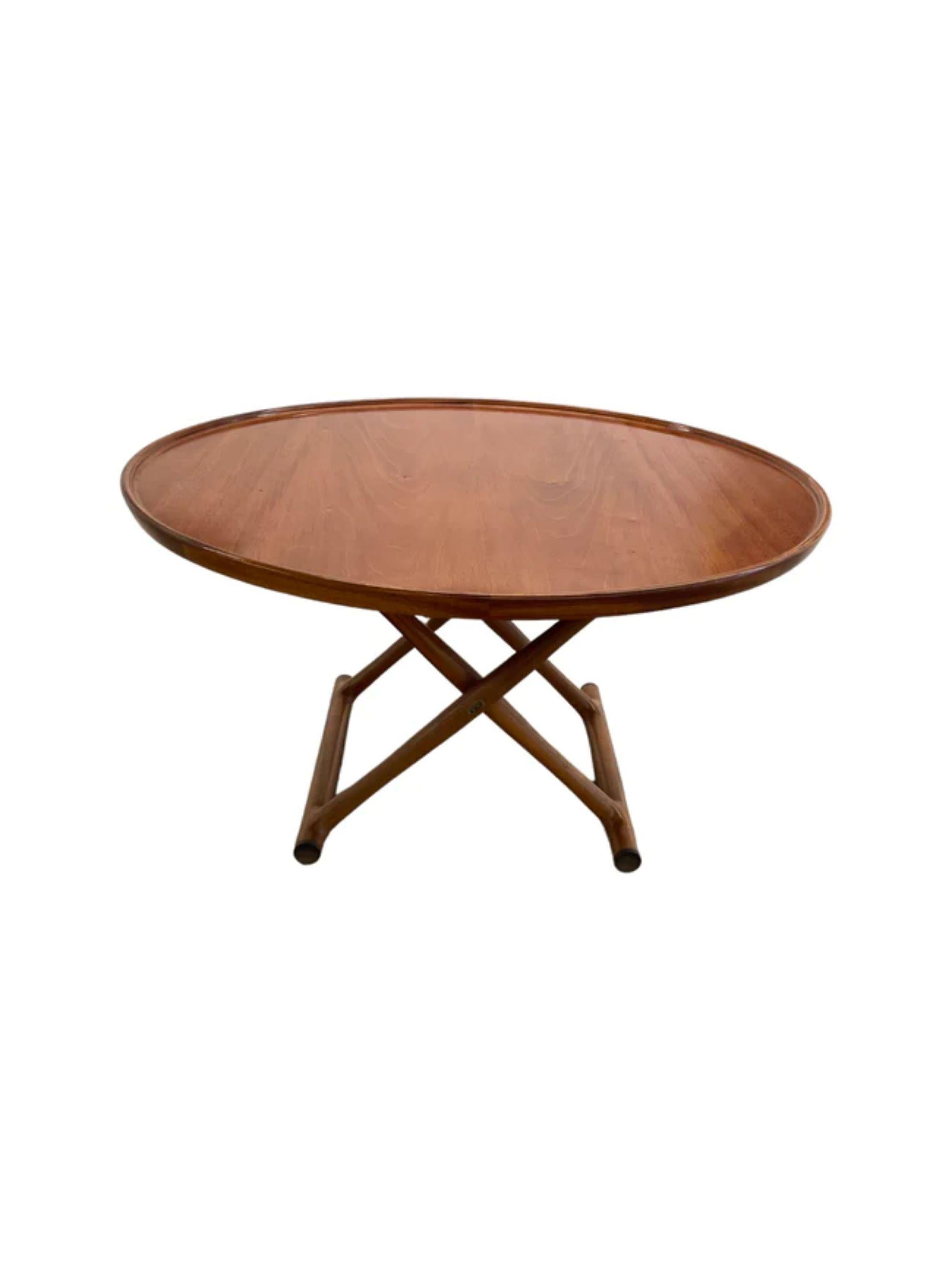 Mogens Lassen rare large size Mahogany early “Egyptian” folding occasional coffee table for A.J. Iversen, Denmark circa 1940. In excellent condition.

Materials: Cuban Mahogany, brass
Dimensions: 20 1/2