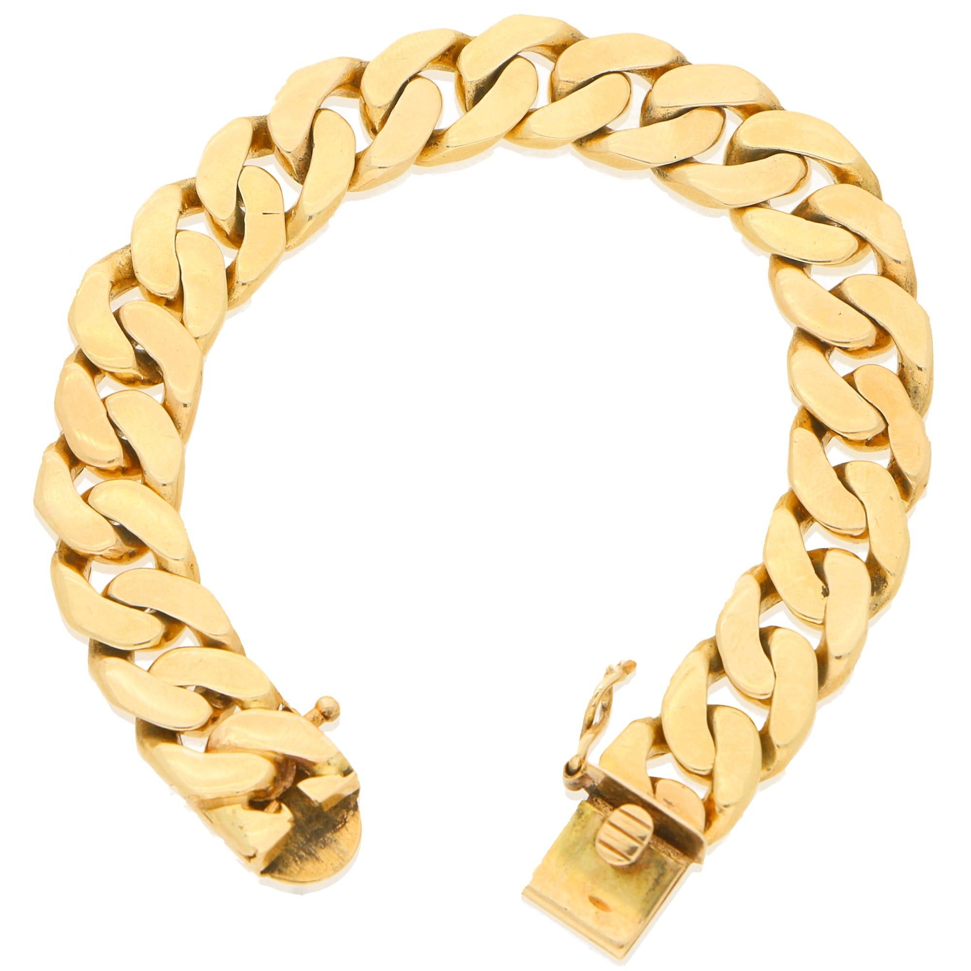 A vintage heavy cuban-link chain bracelet in 14-karat yellow gold, doubly secured with a click-shut clasp and a safety catch fitting. Dimensions: 15.5cm in length. Gross weight: 34.94g.