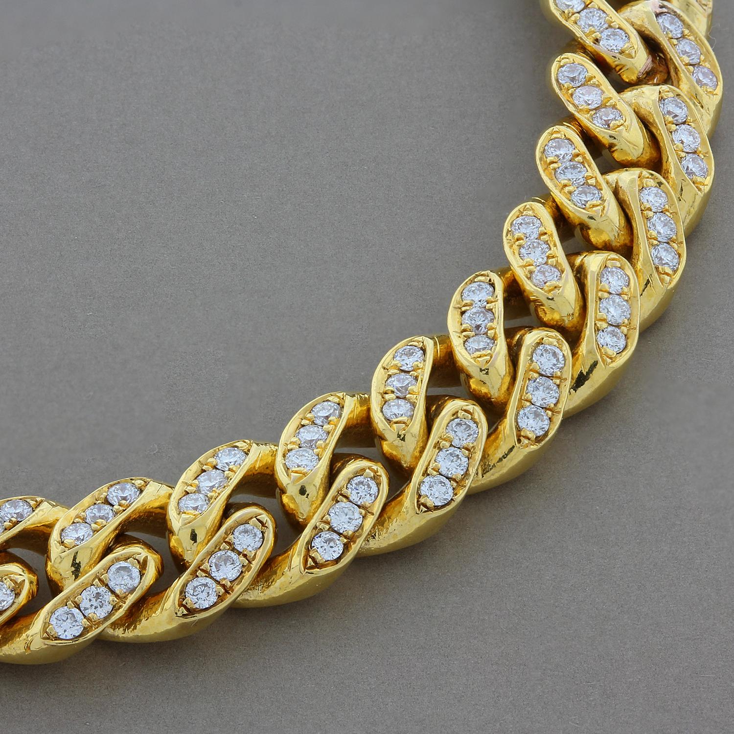 A perfect Cuban link bracelet to wear day or night.  It features 2.71 carats of VS quality round cut diamonds prong set in each 18K yellow gold link. The bracelet is secured by a lobster claw clasp.

Fits wrists up to 7.5 inches
Bracelet Width: 0.25