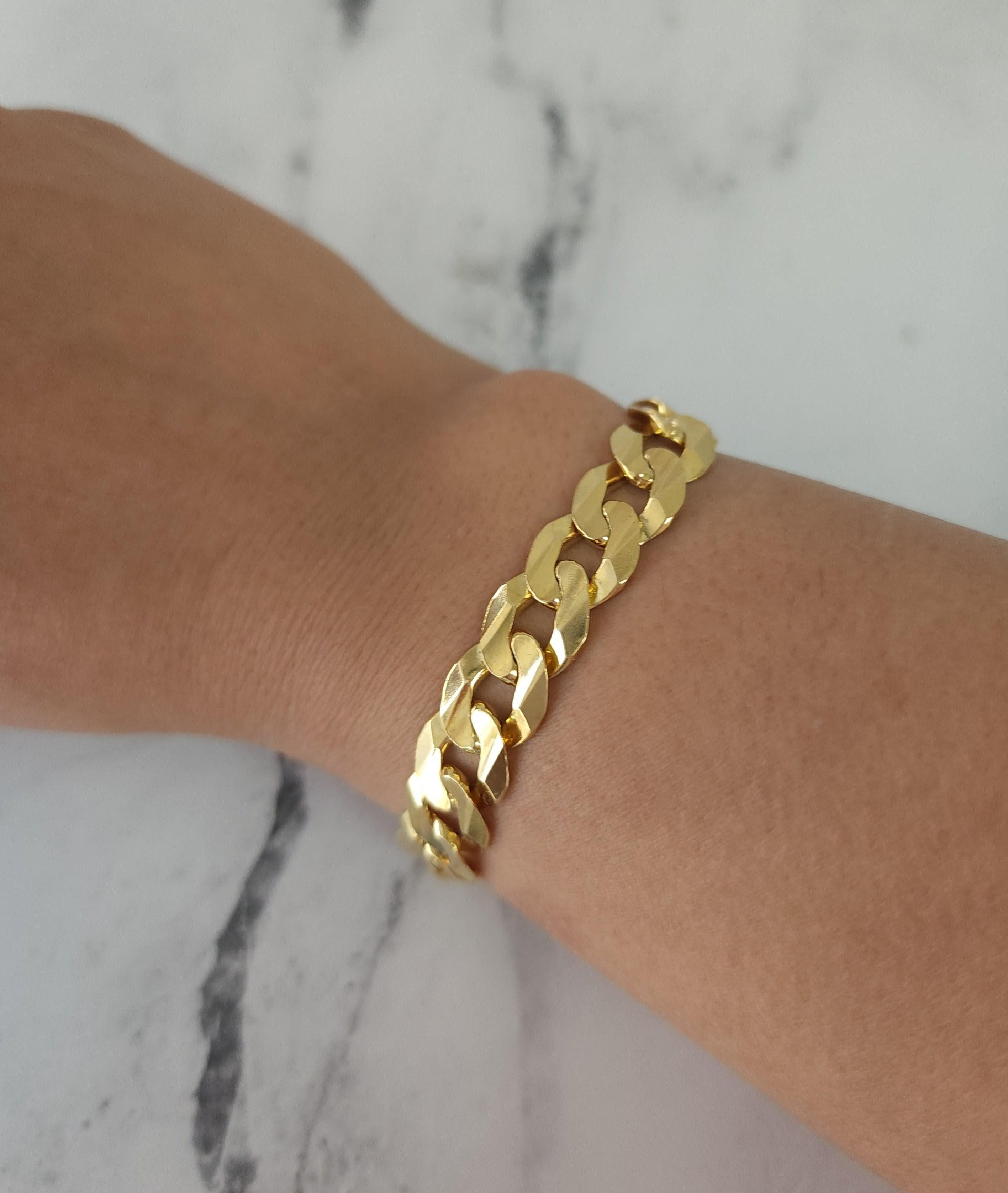 ♥ Resumen del producto ♥

Metal: Oro amarillo de 14 quilates 
Peso: 29 gramos 
Longitud: 7,5 pulgadas
Anchura: 11 mm

Oro amarillo macizo de 14 quilates, no chapado en oro ni con baño de oro. 