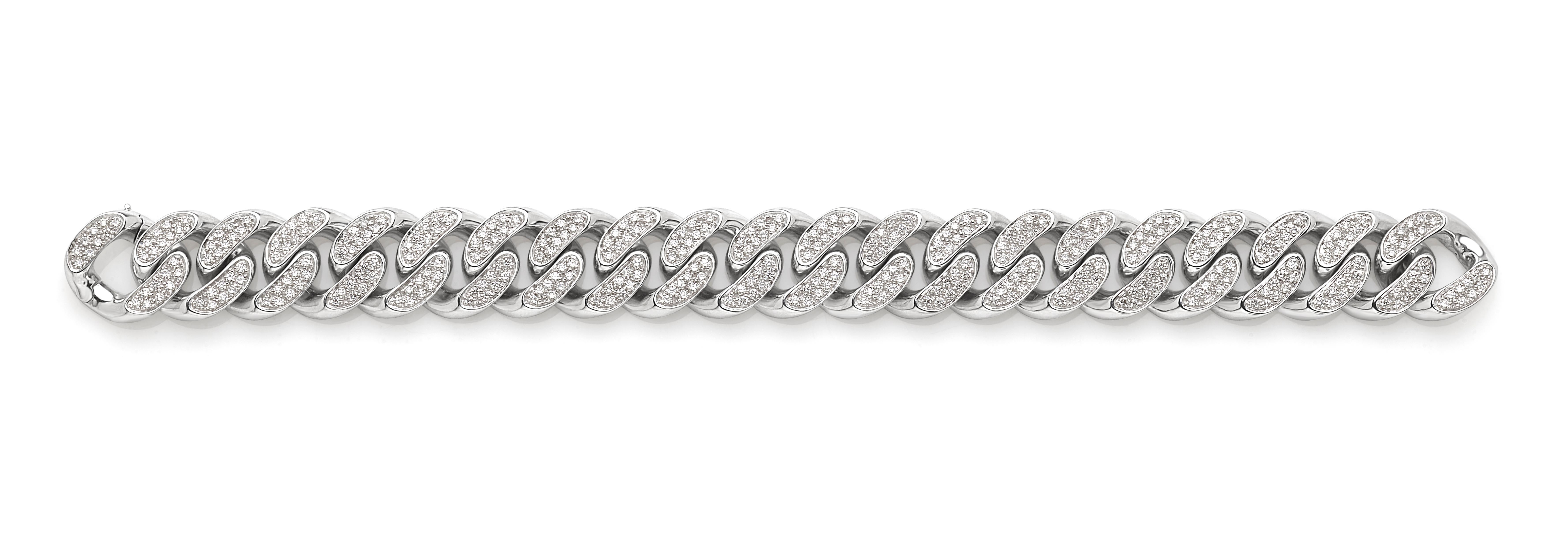 Description:
This exquisite Cuban bracelet is handcrafted in Italy from solid 18 karat white gold. It features a sturdy and stylish design, accented with dazzling white diamonds that add a touch of luxury and brilliance to this classic