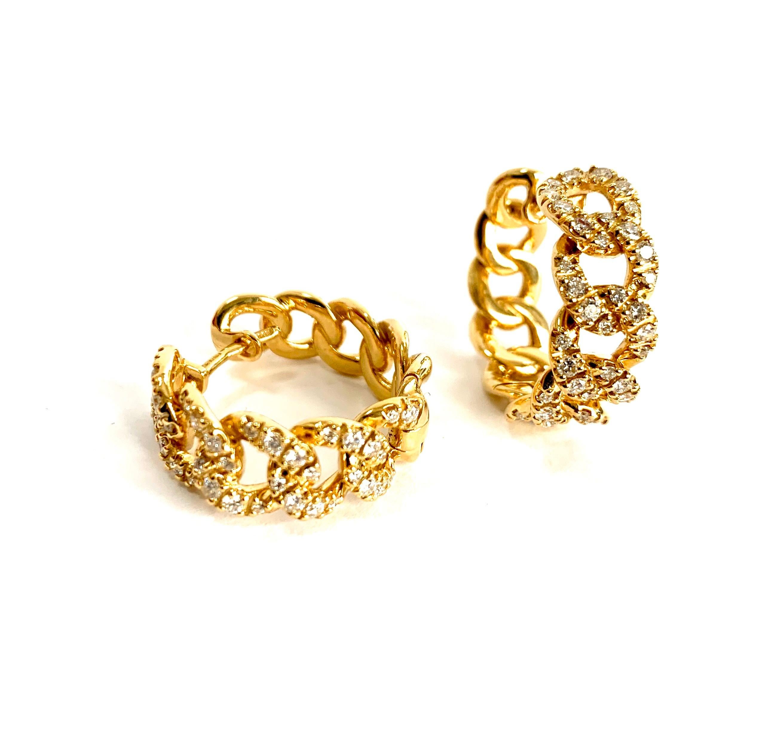 cuban solid yellow gold earrings hand made in italy
weight of gold gr 16.4
white diamond clarity g quality vvs1 ct 1.05