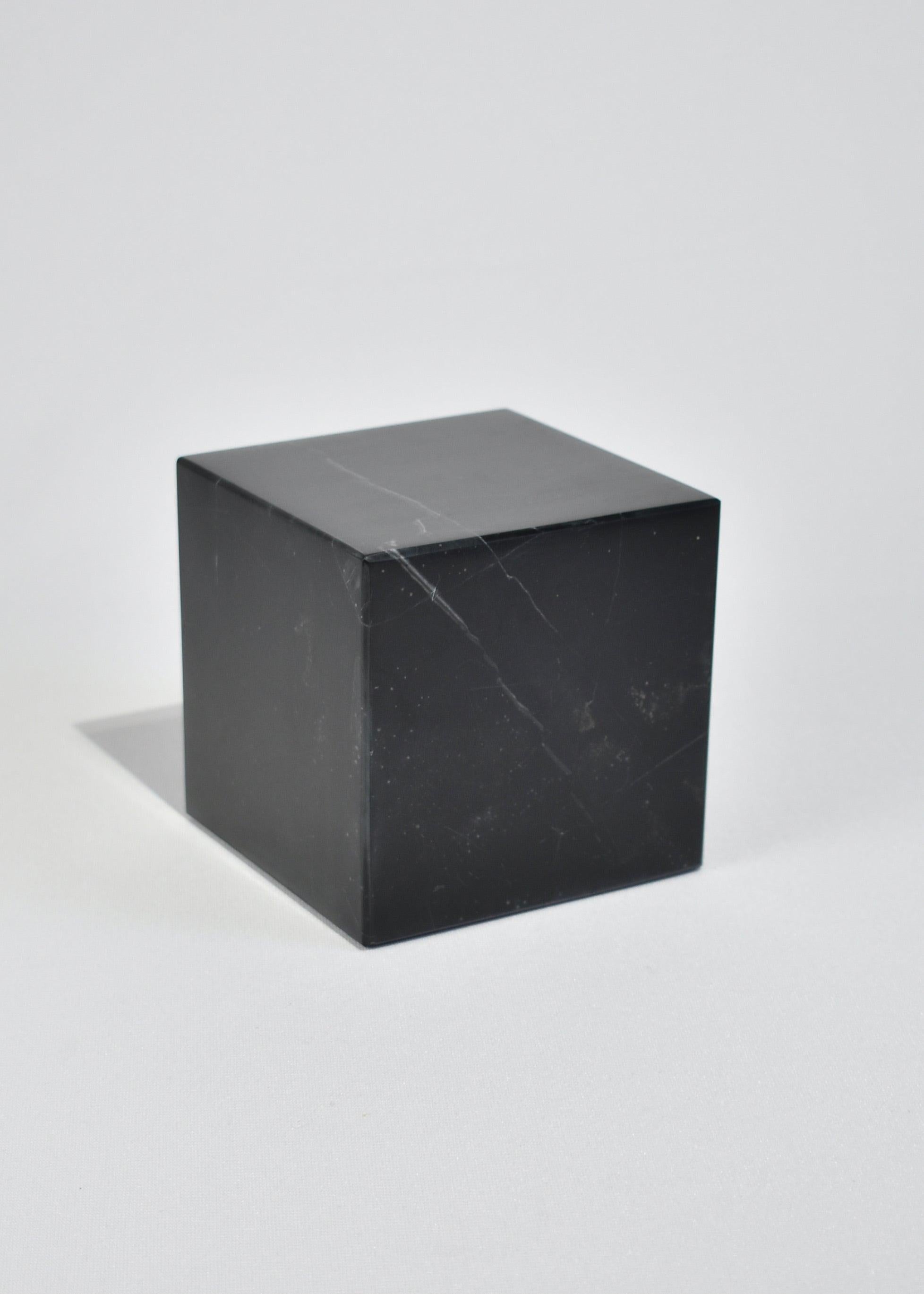 The cube bookend by Casa Shop, part of our stone collection handmade by artisans in Perú. Featuring hand-carved shapes in Black Onyx, Red Jasper, and Green Serpentine. Sold individually with the intention of mixing colors and shapes to make your set